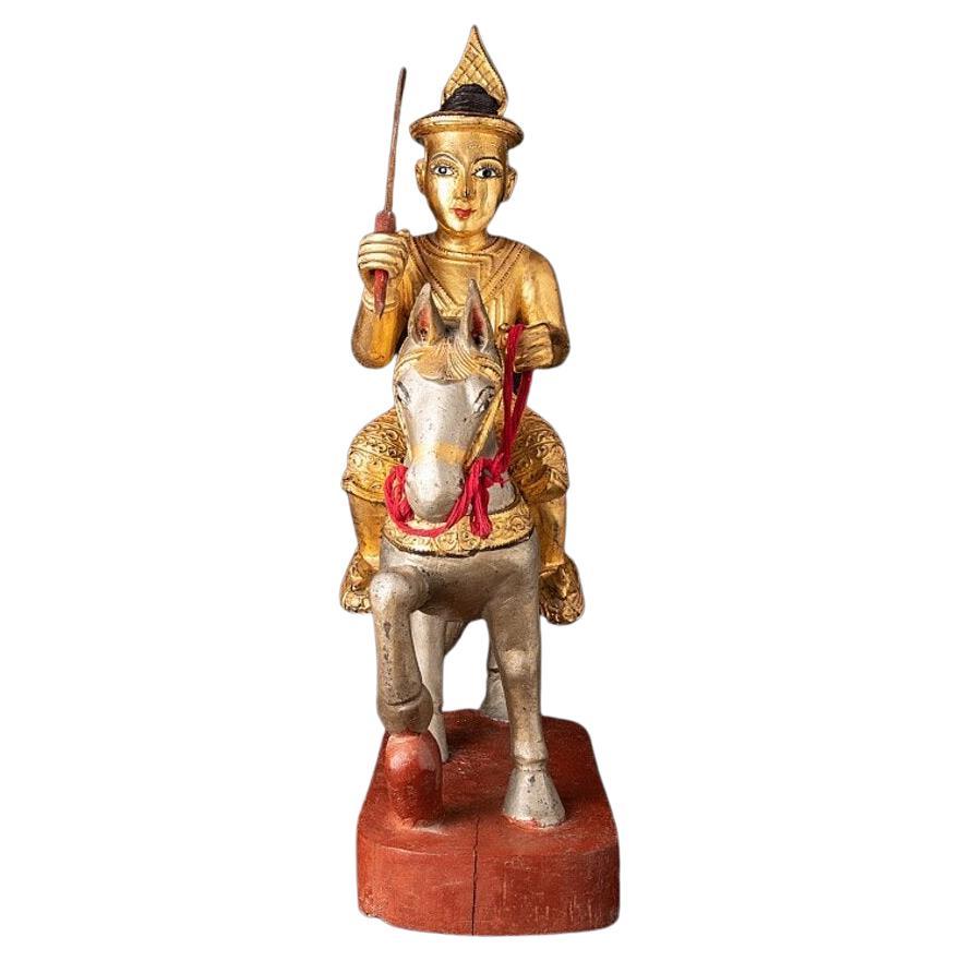 Ancienne statue en bois Nat sur cheval de Birmanie en vente