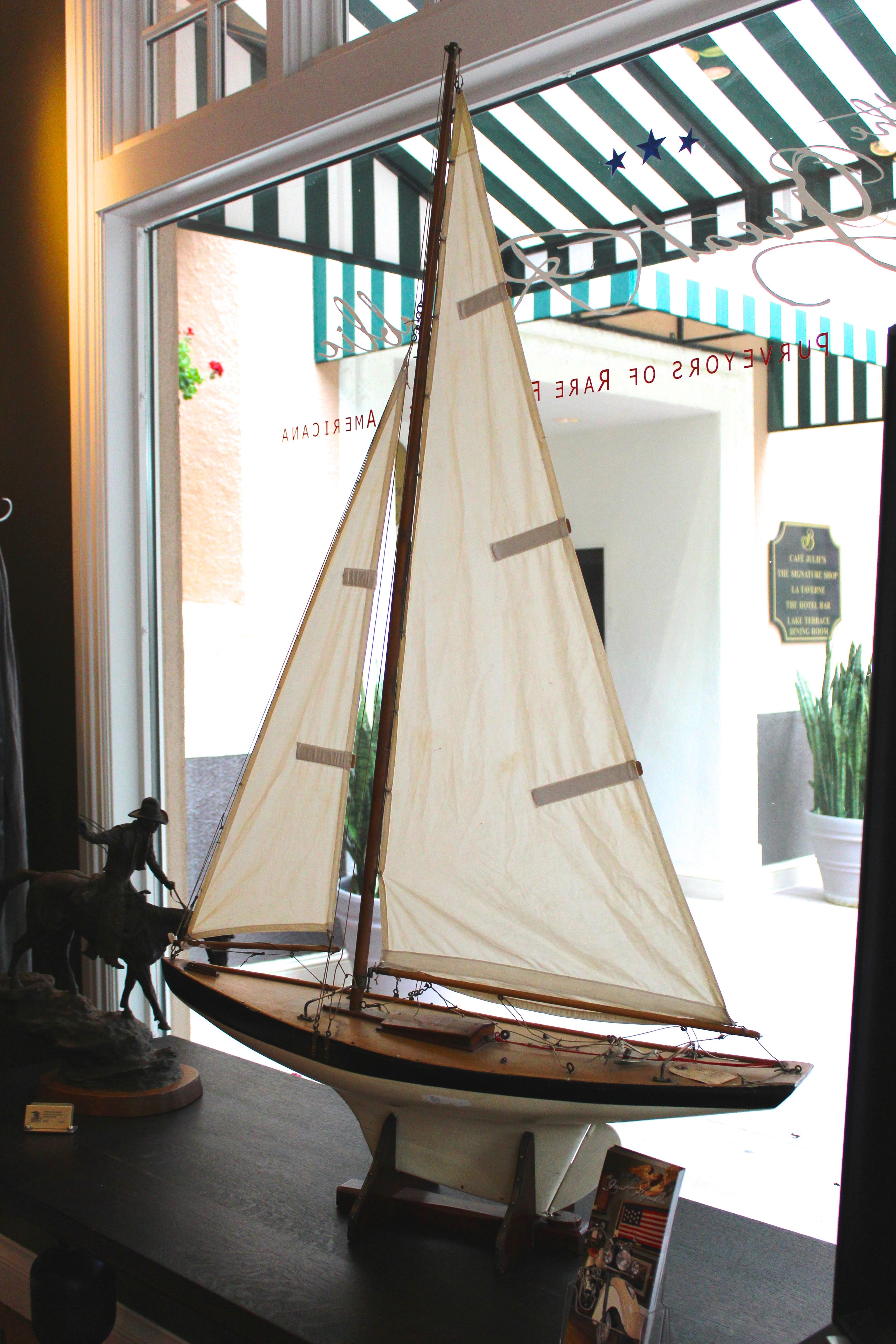 This antique wooden pond yacht was built in 1910 and would have been raced on British ponds. Model, or pond, yachting was the pastime of building and racing model yachts. It was customary for ship builders to make a miniature model of their vessels