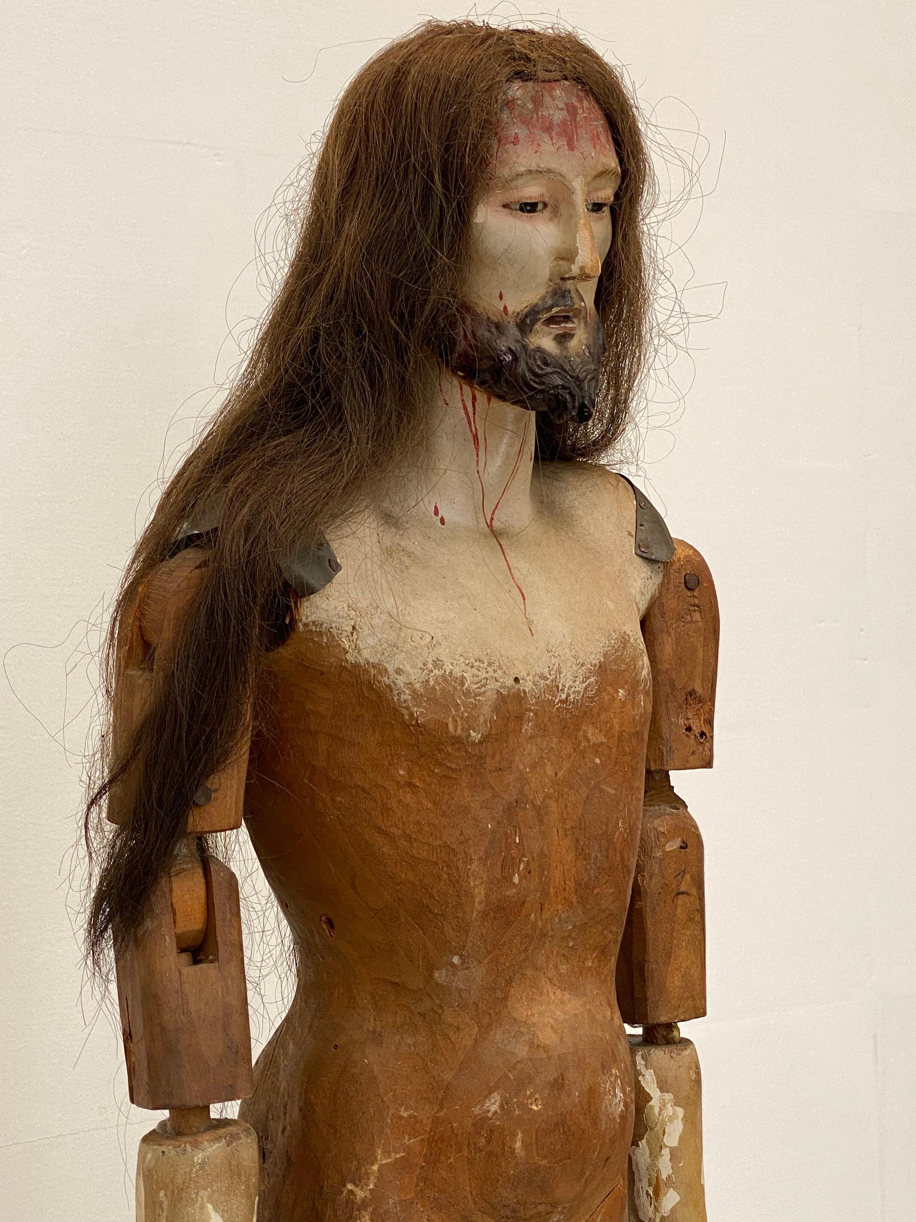 Exceptional Santos ' Jesus Christ'  From The Philippines, Late 18 th Century,
beautifuly sculpted with a fantastic old patina and shine of the 
Polychromed Wood,great articulation of the human body,
the Santos is finished with Human