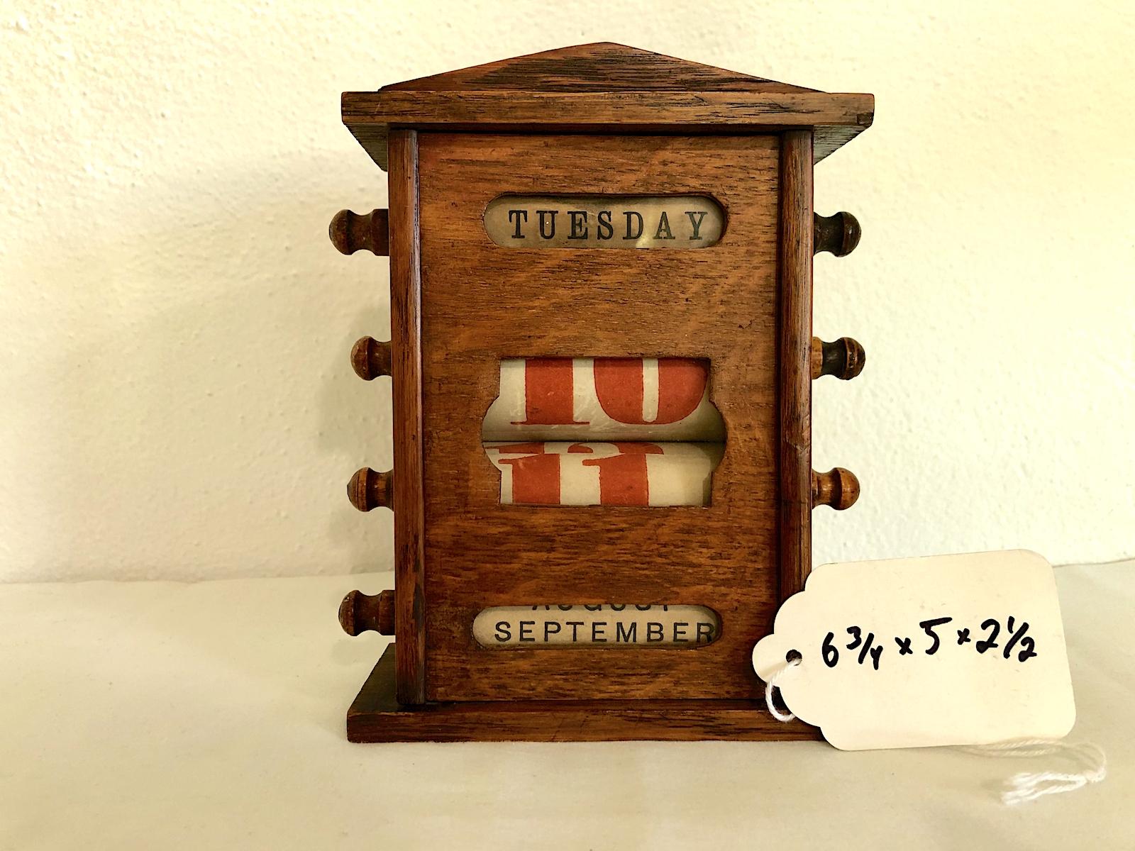 Carved Antique Wooden Scrolling Desk Calendar Keeps Time Perpetually For Sale