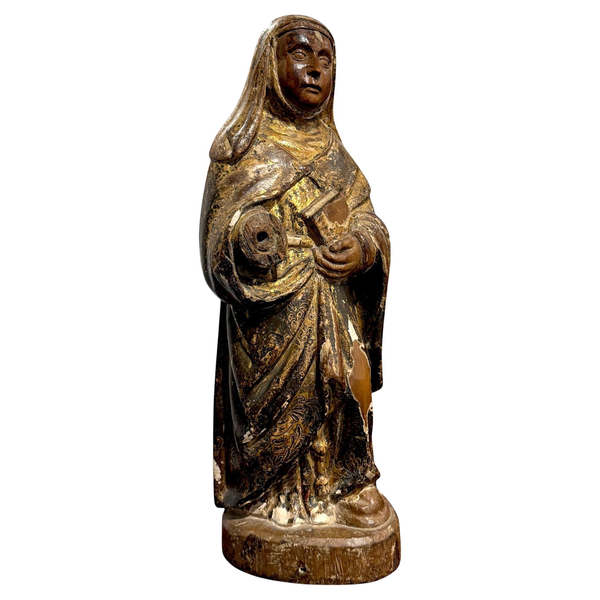 Sculpture ancienne en bois d'une sainte femme, 17e siècle