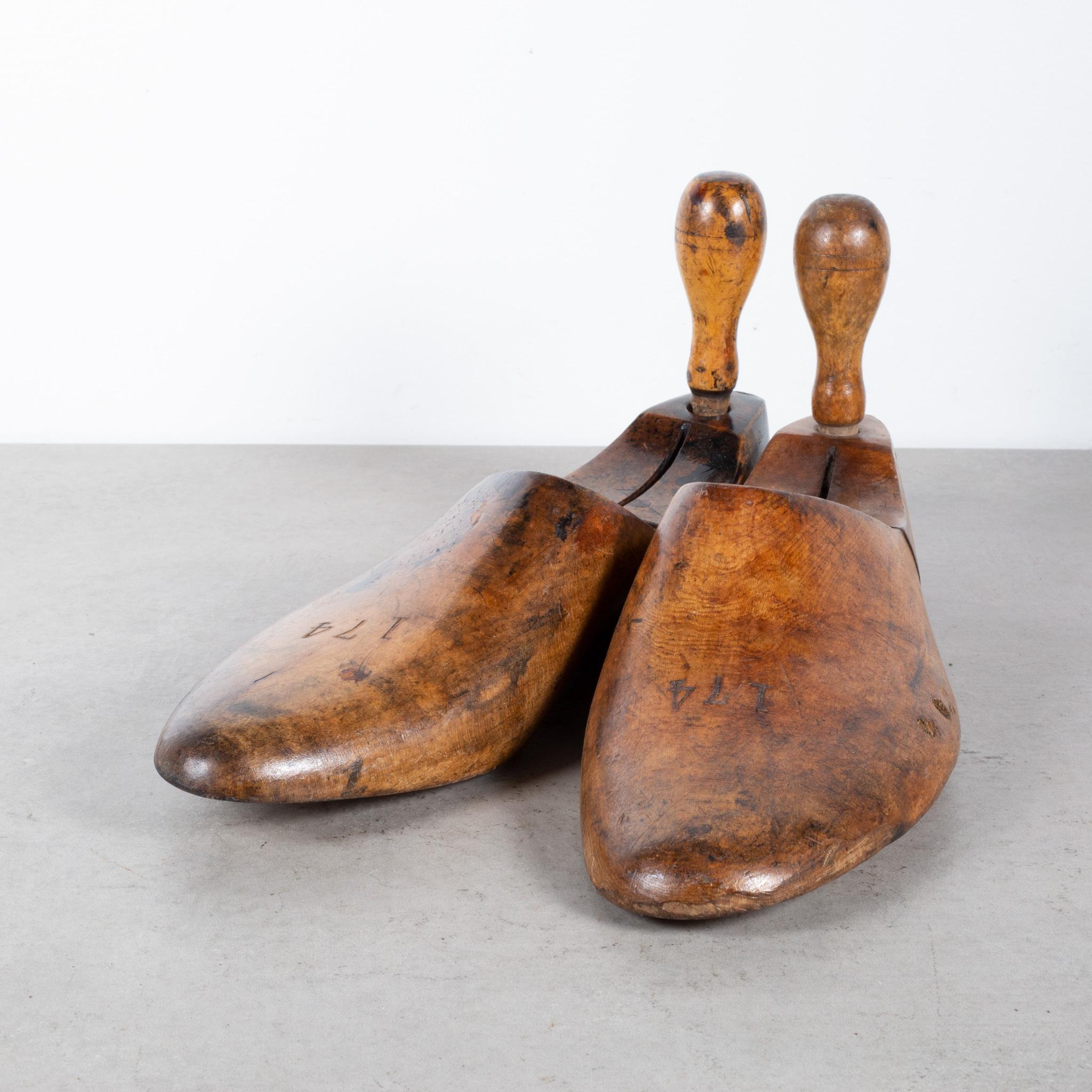 ﻿ABOUT

Price is per pair. Decorative only. Sizes unknown. Please specify which pair you would like. 

Original pairs of cobbler's wooden shoe lasts. Refinished and shellacked.

    CREATOR Unknown.
    DATE OF MANUFACTURE c.1920
    MATERIALS AND