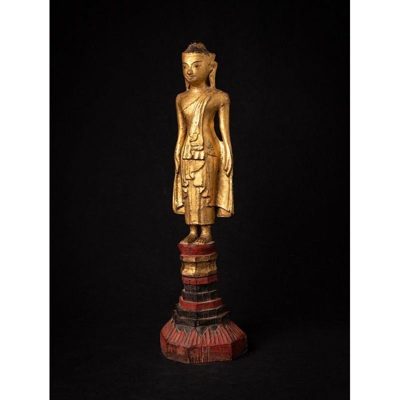 Material: wood
54 cm high 
14,8 cm wide and 13,5 cm deep
Weight: 1.732 kgs
Gilded with 24 krt. gold
Shan (Tai Yai) style
Originating from Burma
Early 19th century

