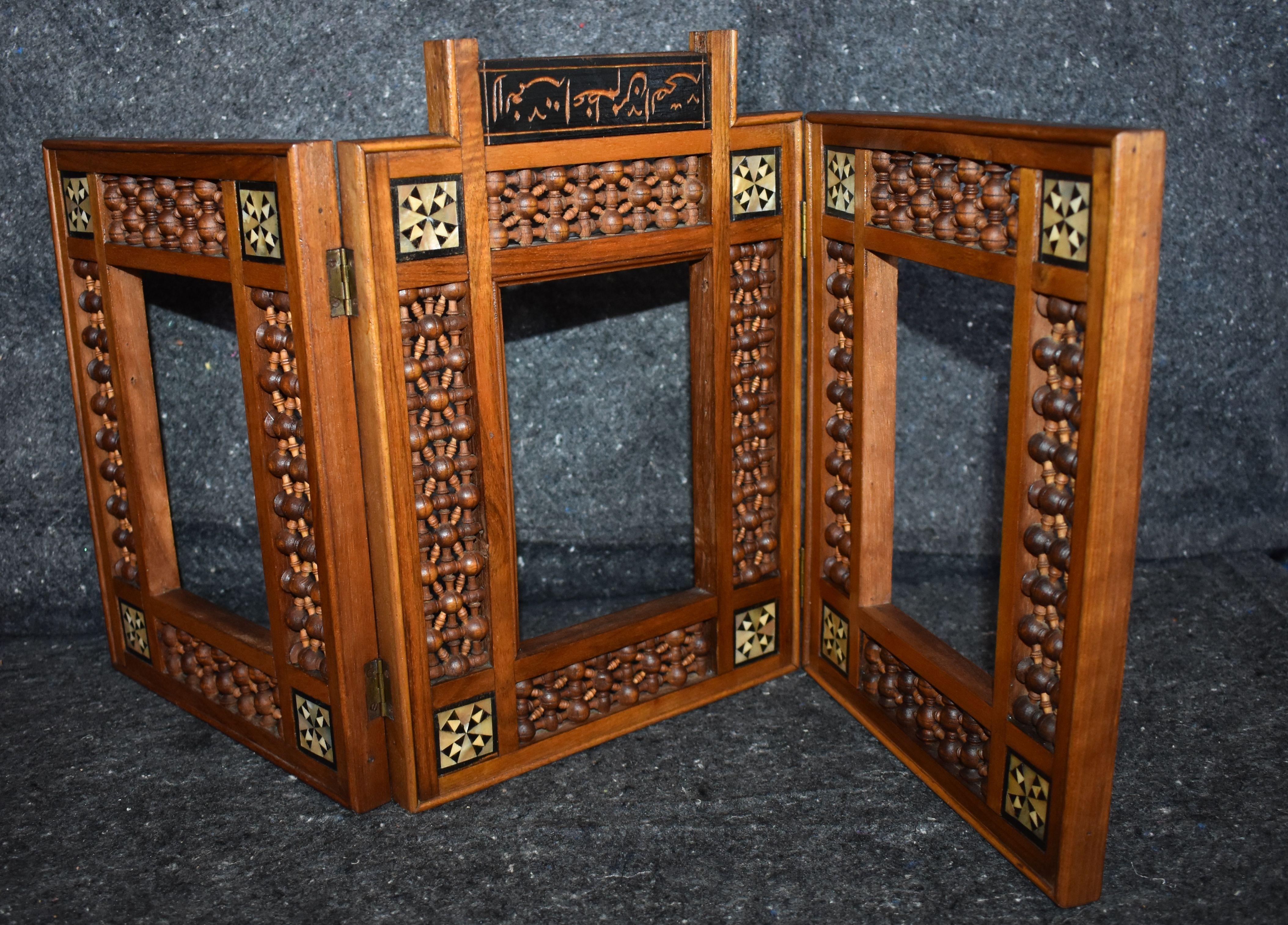 Antique wooden Syrian / Middle Eastern picture frames or mirror frame with turned Mashrabiya panels and with mother of pearl inlays.

Dimension of each panel:
W 8.75 inches, D 0.75 inch, H 10.75 inches.