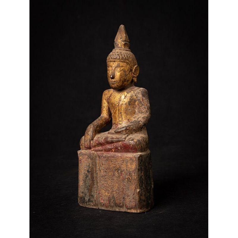 Material: wood
21,7 cm high 
9,1 cm wide and 6,4 cm deep
Weight: 0.328 kgs
Gilded with 24 krt. gold
Bhumisparsha mudra
Originating from Thailand
18th century

