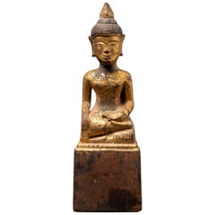 Antique wooden Thai Buddha statue from Thailand