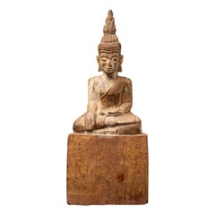 Antique wooden Thai Buddha statue from Thailand