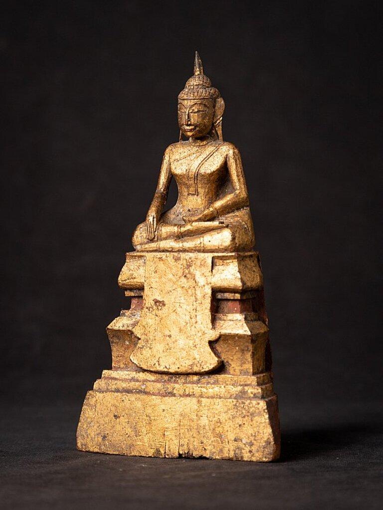 Material: wood
Measures: 17,1 cm high 
9,5 cm wide and 4,1 cm deep
Weight: 0.126 kgs
Gilded with 24 krt. gold
Bhumisparsha mudra
Originating from Thailand
19th century.
  