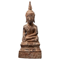 Antique wooden Thai Budha statue from Thailand