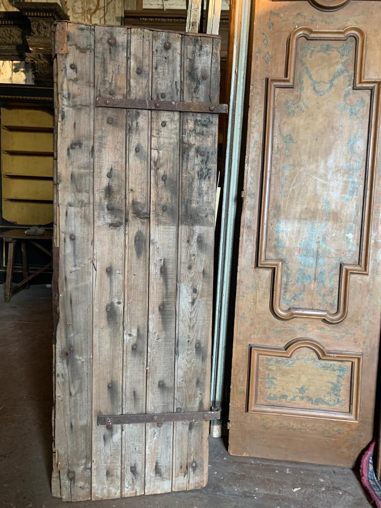 Italian Antique wooden tower door covered in iron, 19th century Italy