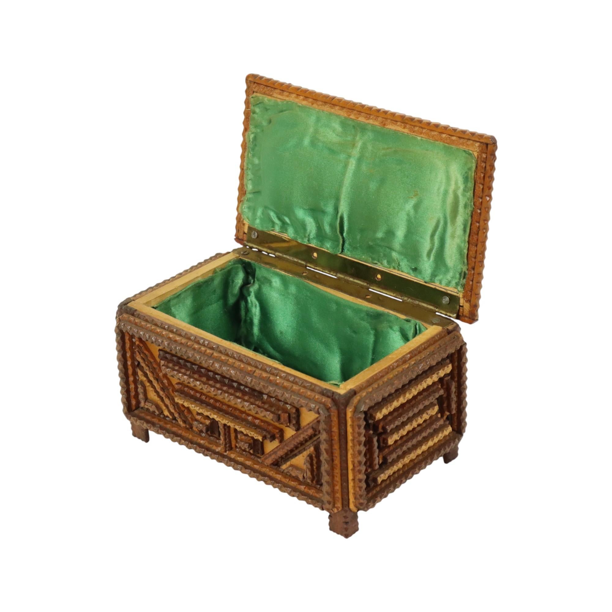 Beautiful antique tramp art box, jewelry box or trinket box, trinket box, made of wood and lined with green fabric, made in the first half of the 20th century.

Beautiful form of folk art, anyone could make a tramp art object with what they had on