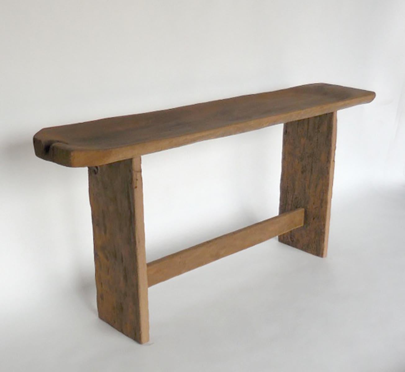 Narrow console or sofa back table made from antique batea, wooden tray, from Guatemala. Base added later and finished to match top. Soft worn patina.
 