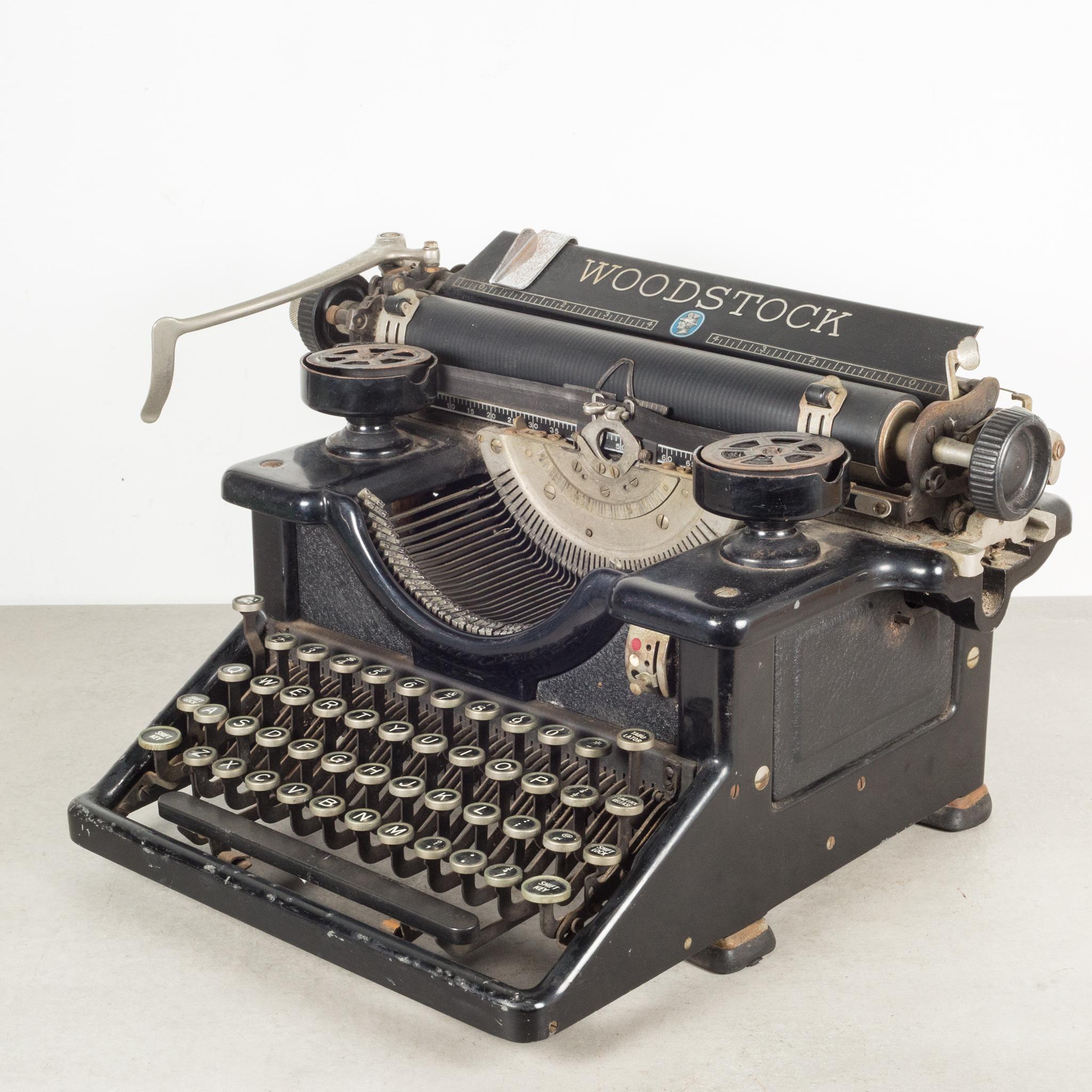 About

An antique Woodstock typewriter with a 16 inch carriage. Original decals on the front and back. The keys are nickel with black with white numbers. Four rows of keys. The carriage slides smoothly from side to side. All the keys strike
