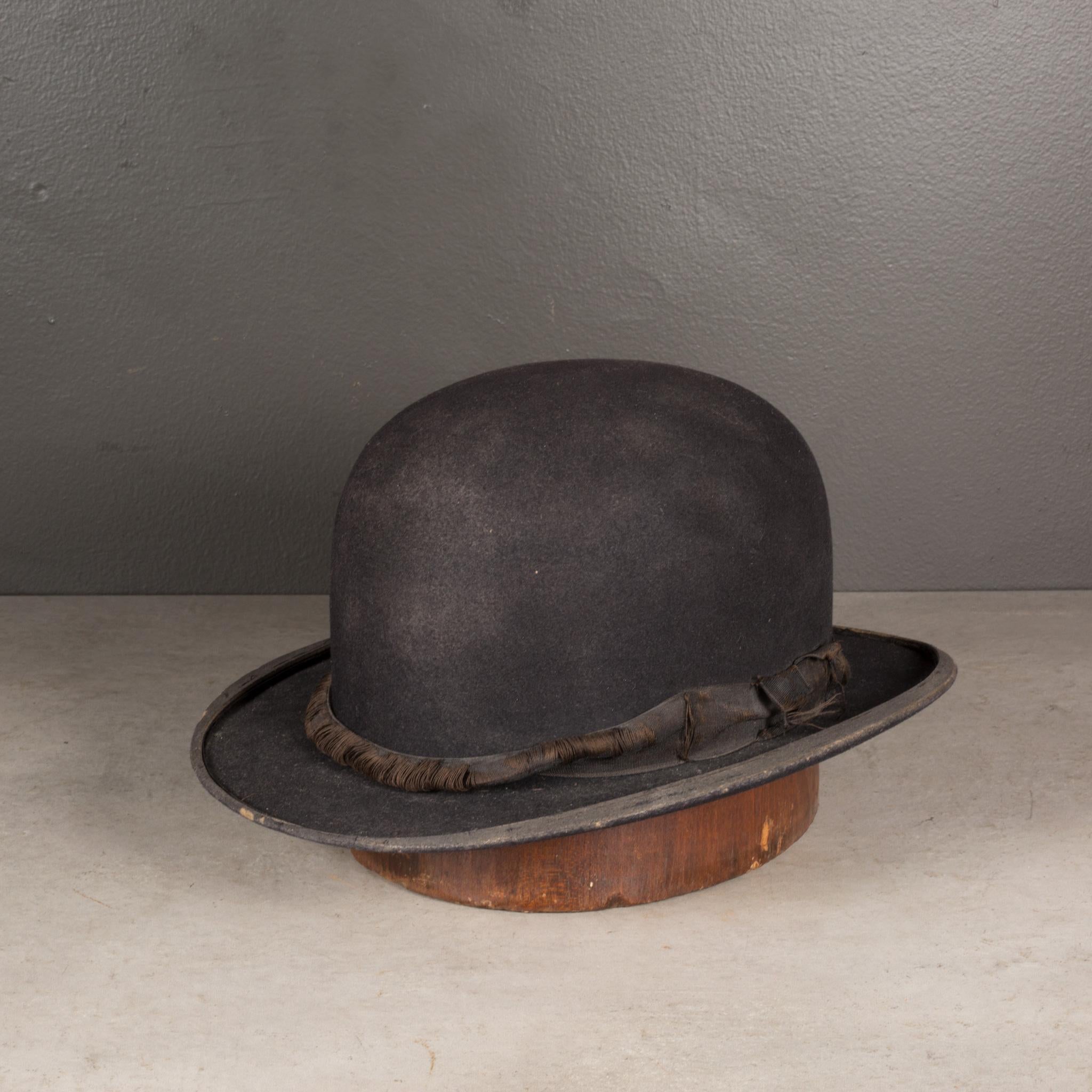 ABOUT

An original wool bowler hat. Hat block not included.

 CREATOR Unknown.
 DATE OF MANUFACTURE c.1920-1940.
 MATERIALS AND TECHNIQUES Wool.
 CONDITION Good. Wear consistent with age and use.
 DIMENSIONS H 5 in. D 10 in. W 12
