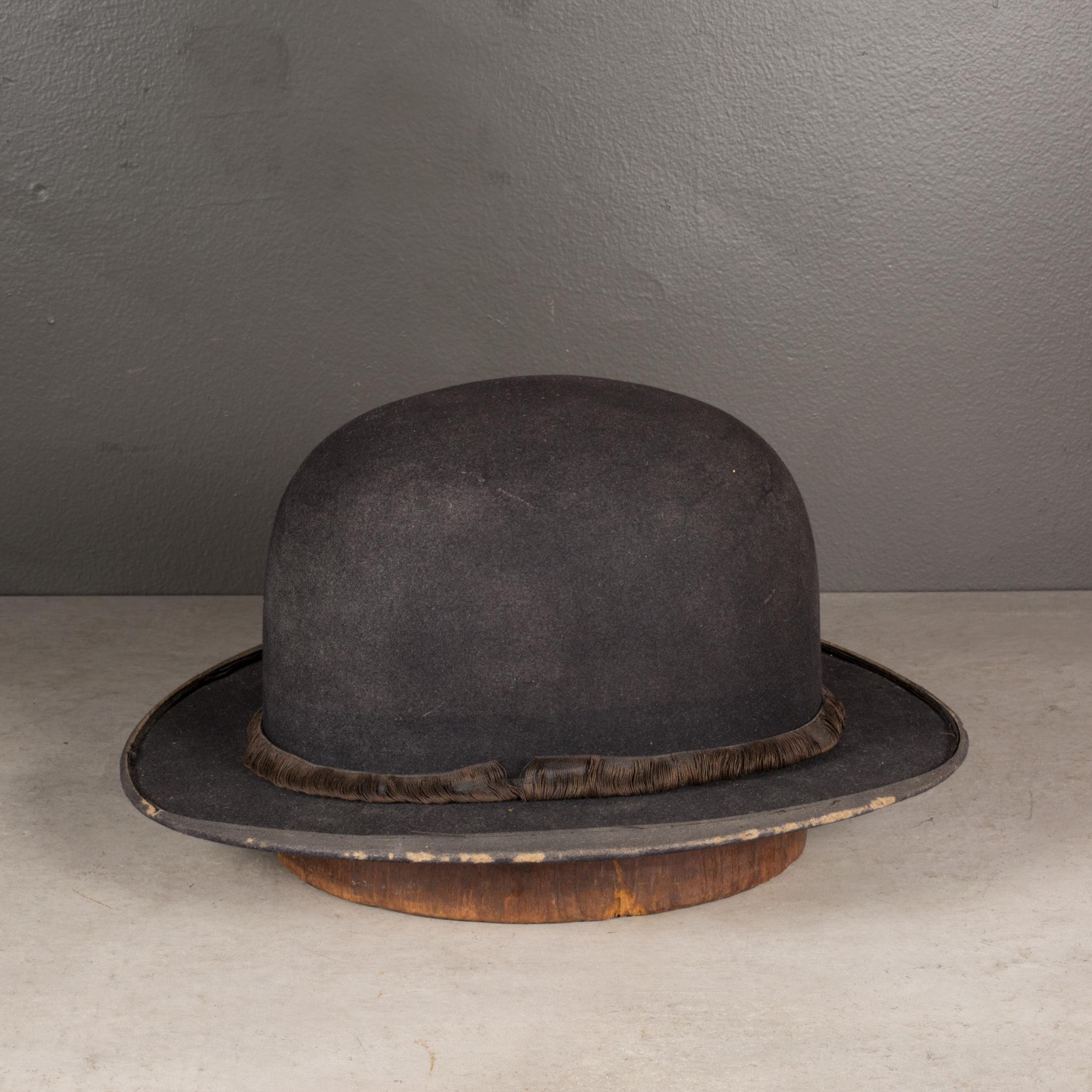 distressed bowler hat