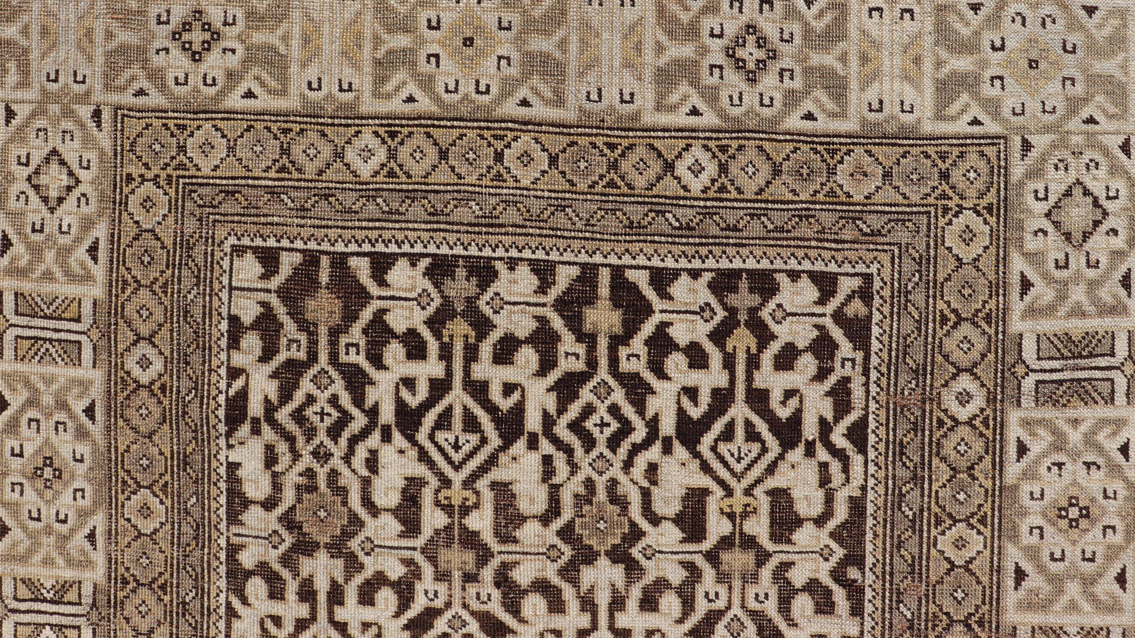 Antique Wool Hand Knotted Caucasian Kazak Rug in Dark Brown Background For Sale 4