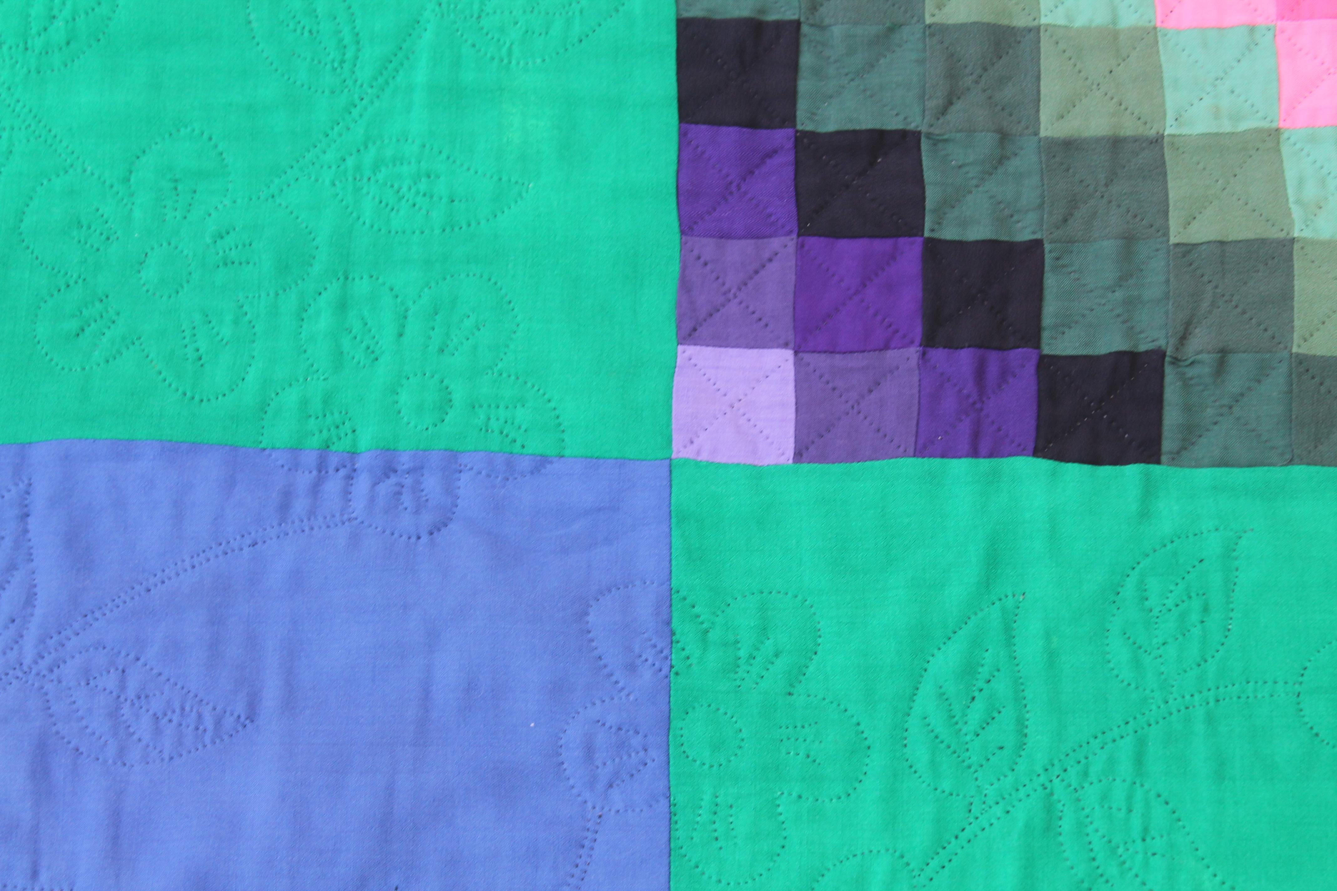 This fine Amish quilt is from Lancaster County, Pennsylvania. It is mostly wool and cotton made trip around the world or sunshine quilt. It has initial on the reverse side or back. The backing is made of grey cotton shambre.