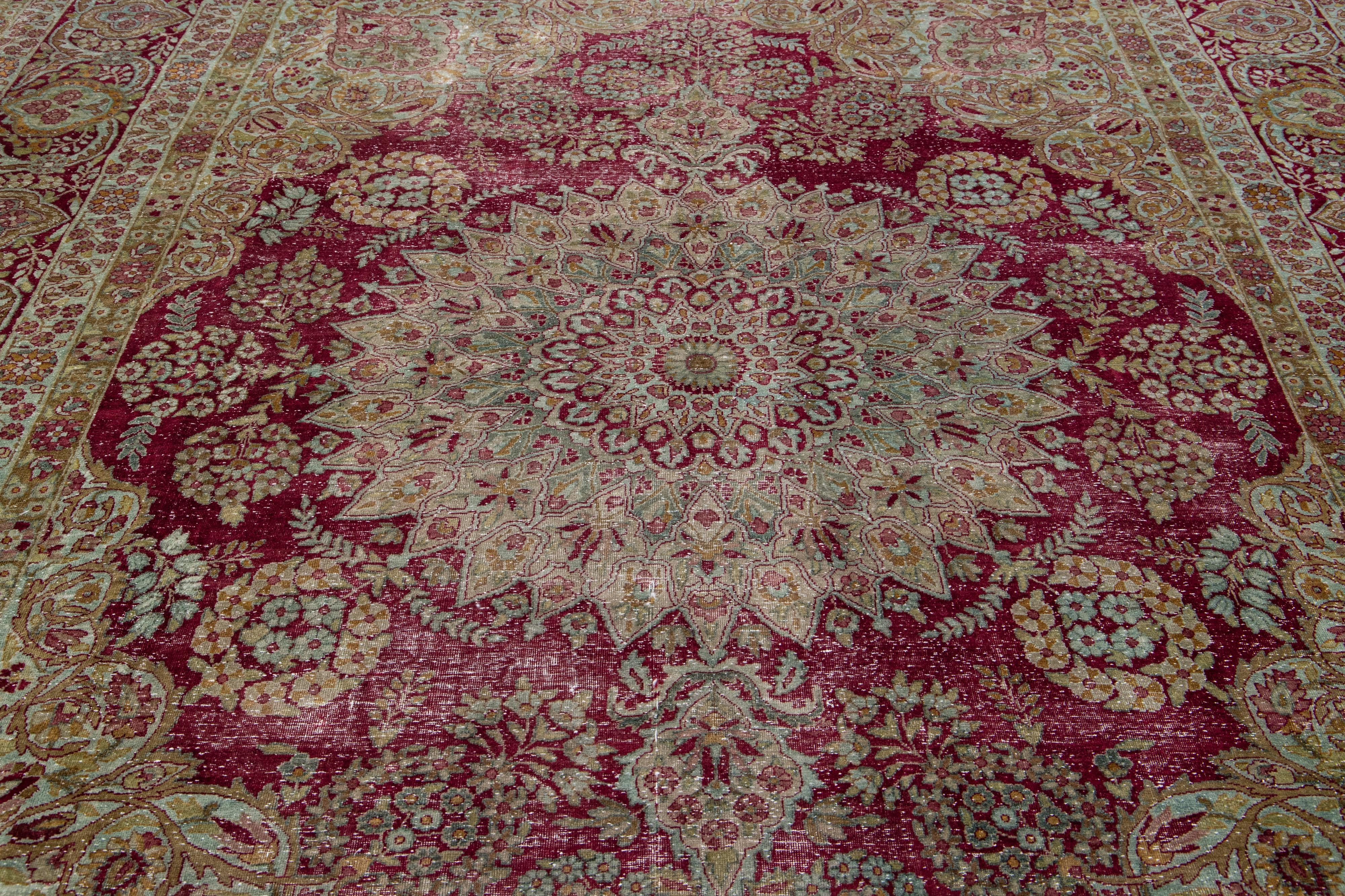 20th Century Antique Wool Rug Persian Kerman featuring a Medallion Floral Motif  For Sale
