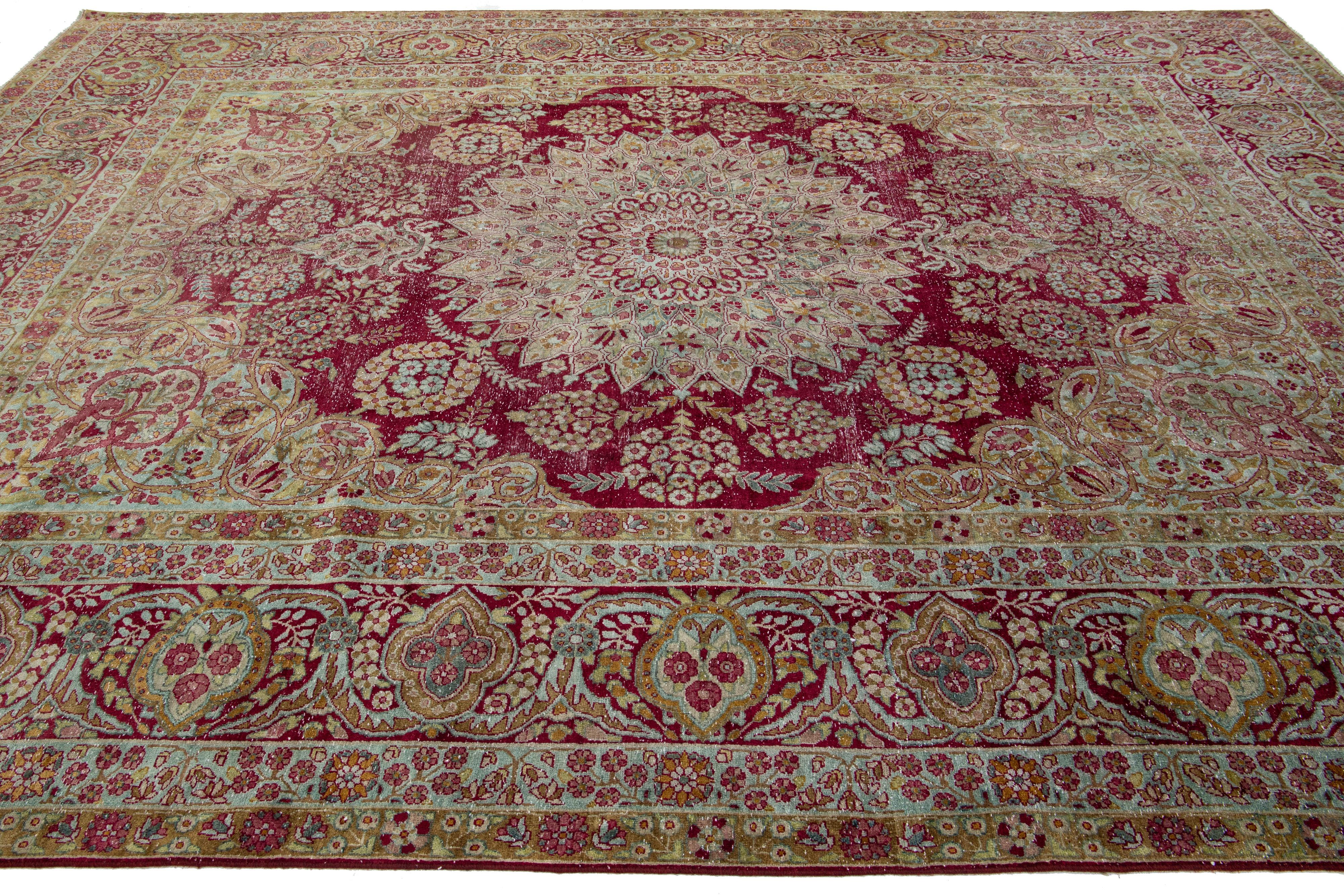 Antique Wool Rug Persian Kerman featuring a Medallion Floral Motif  For Sale 2