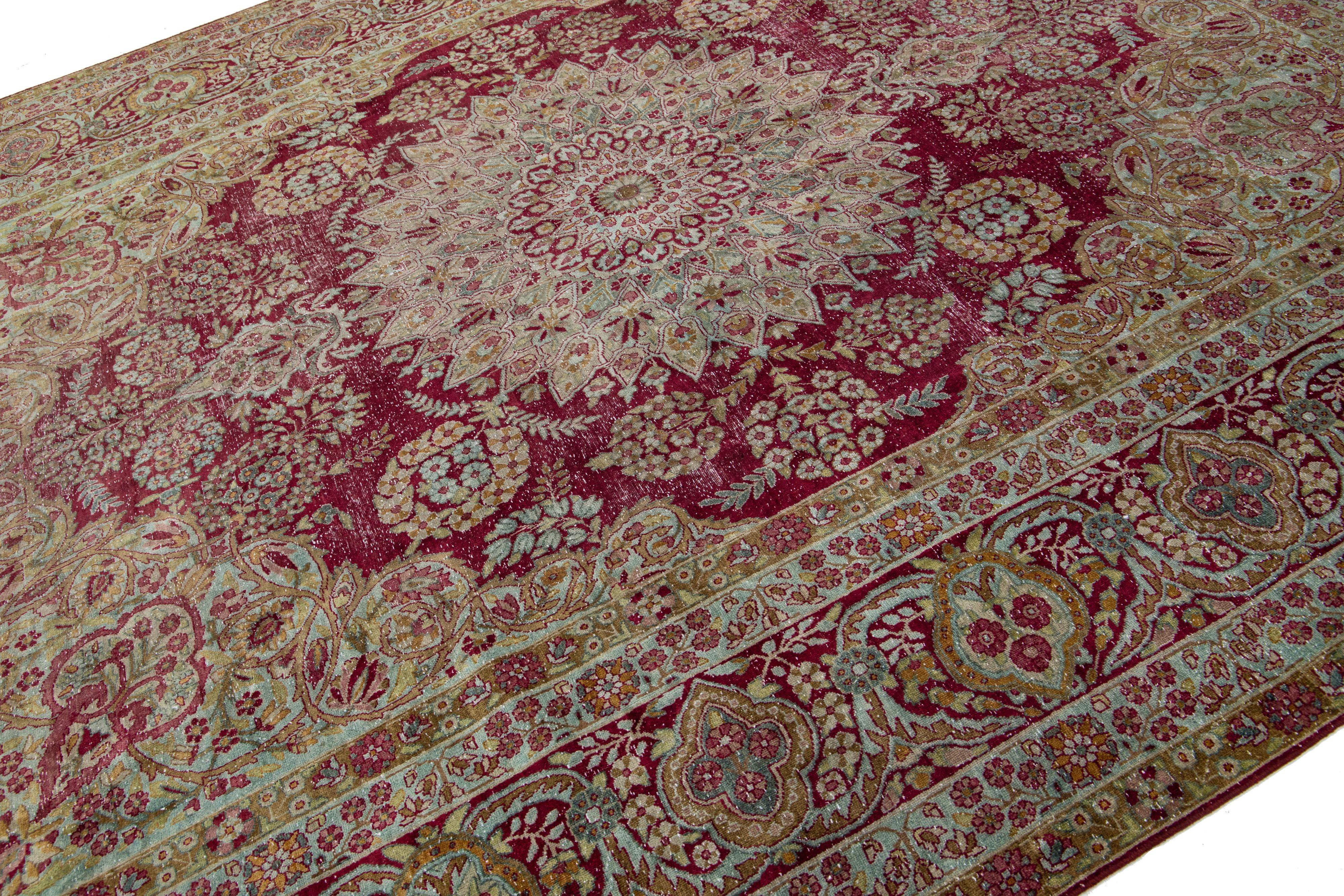 Antique Wool Rug Persian Kerman featuring a Medallion Floral Motif  For Sale 3