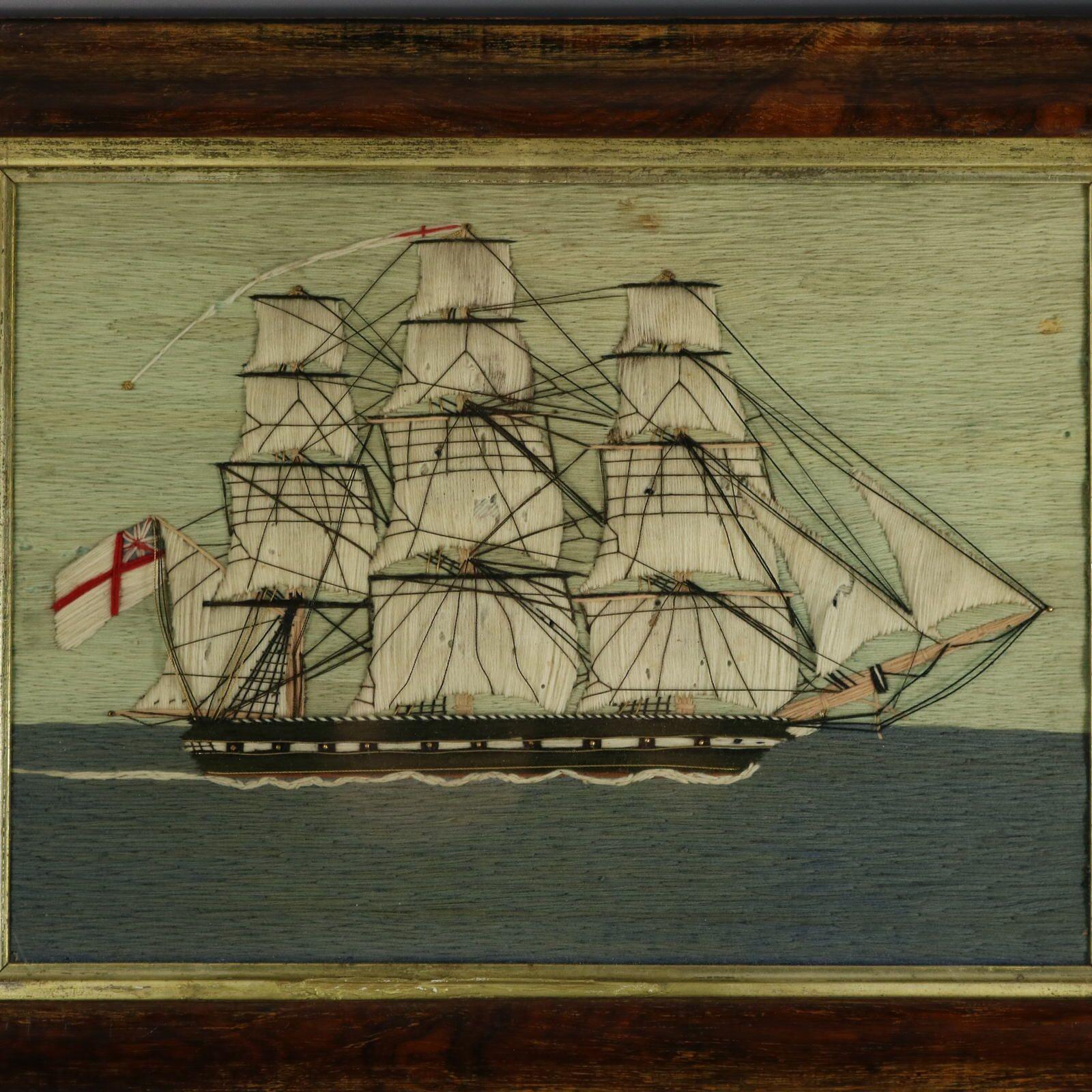 Antique Sailor's Woolwork Embroidery Picture of a three masted ship. The embroidery is worked in wool and cotton in a variety of stitches, on cotton ground. Some details picked out in metallic thread and beads. Colours white, cream, blues, black and