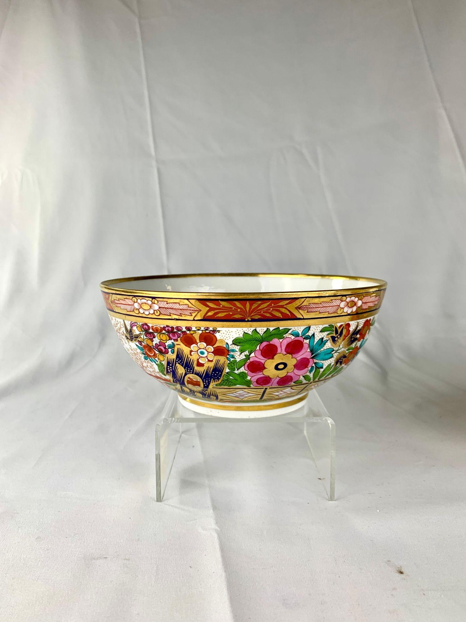 This small porcelain bowl was hand-painted by Worcester during the Barr Flight Barr period, circa 1810.
It is decorated in the richly detailed Fence Pattern, an English interpretation of the Imari style.
The design features a lush garden scene
