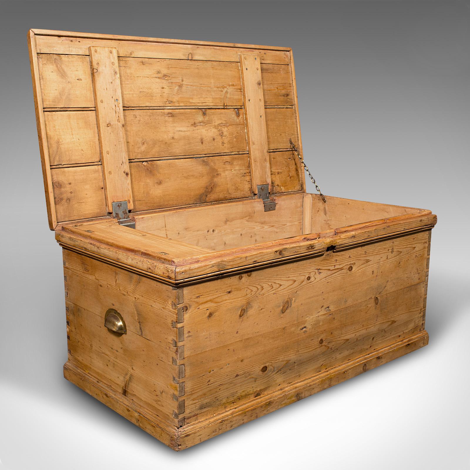 
This is an antique work chest. An English, pine tool trunk with candle box, dating to the late Victorian period, circa 1900.

Delightfully useful pine trunk with a superb fitted interior
Displays a desirable aged patina and in good order
Pine