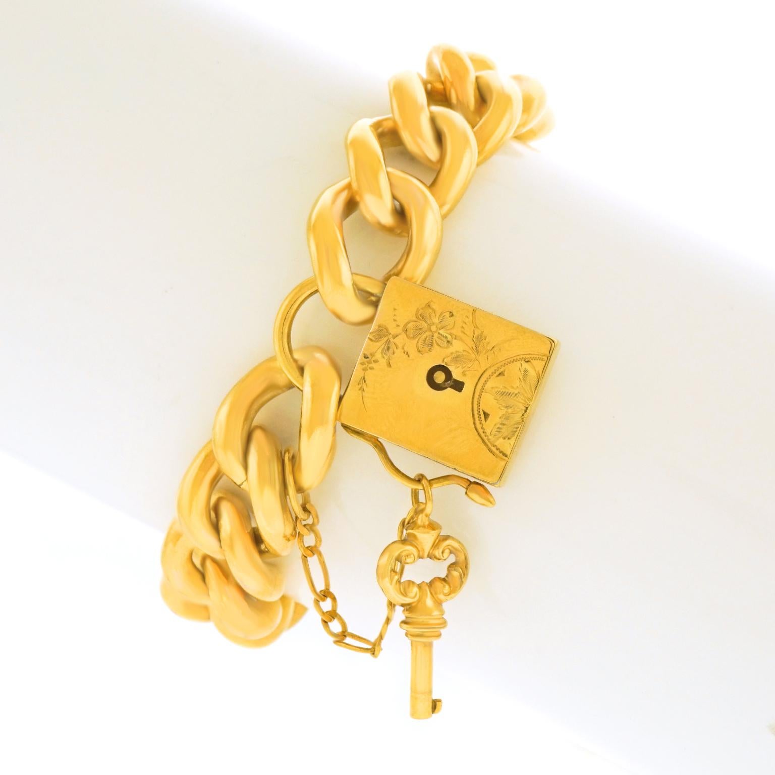 gold bracelet with lock and key