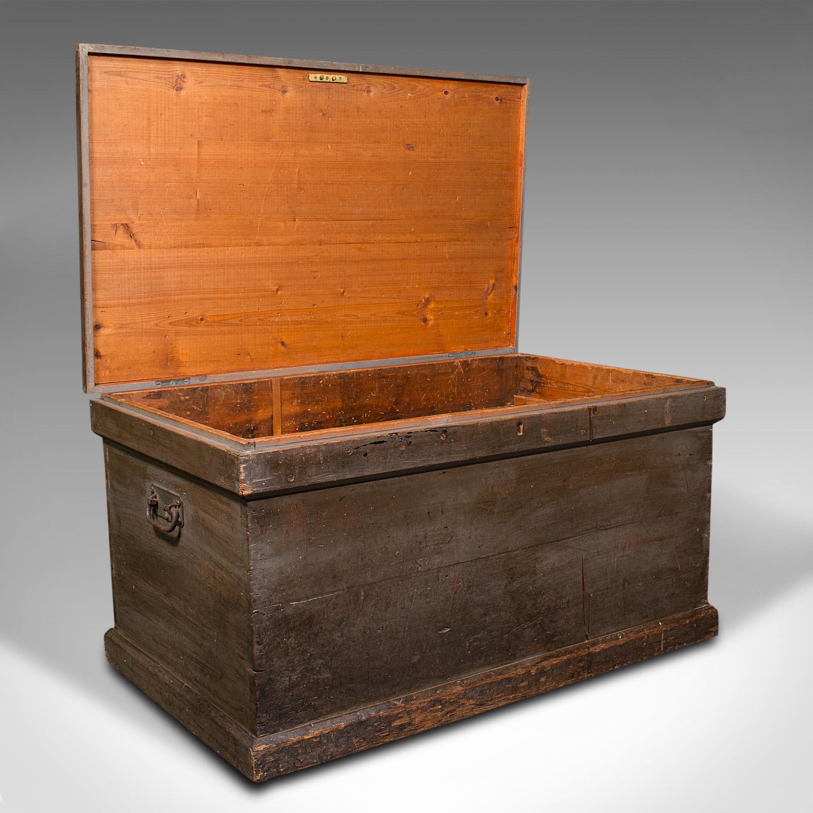 This is an antique workman's chest. An English, pine tool chest or coffee table, dating to the Victorian period and later, circa 1880.

Robust and substantial, with a useful fitted interior
Displays a desirable aged patina throughout
Stained pine