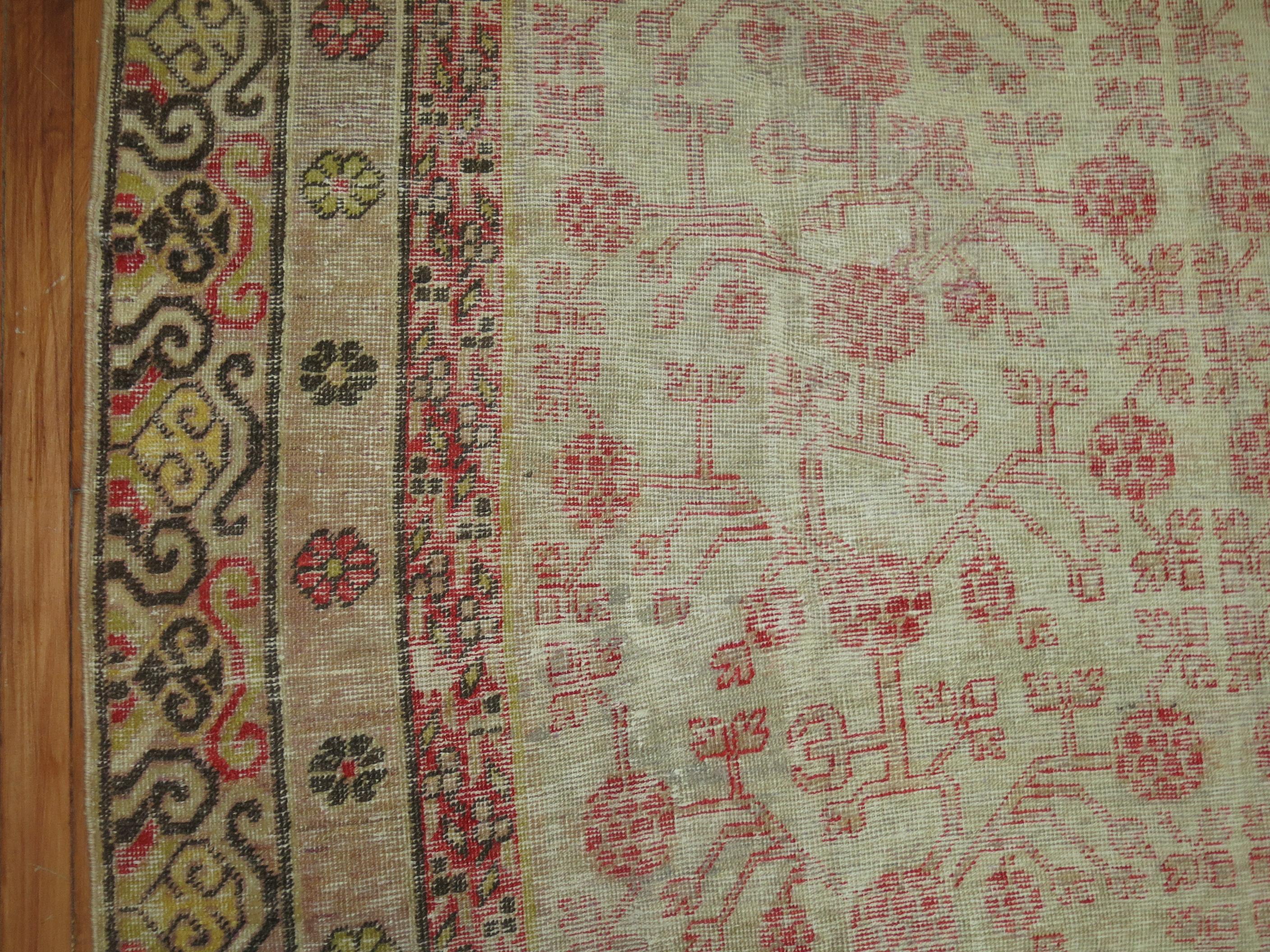 Wool Antique Worn Khotan Rug For Sale