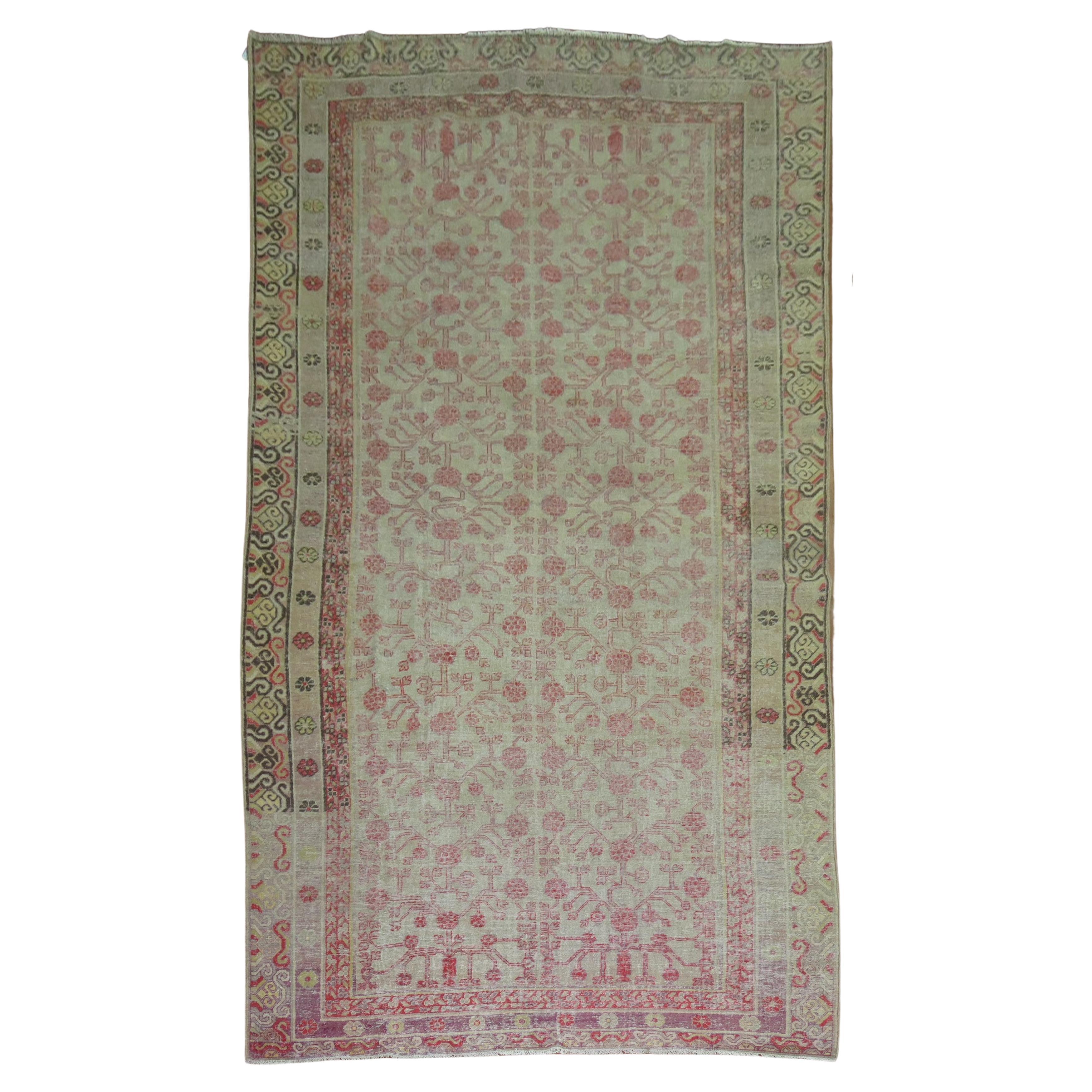 Antique Worn Khotan Rug