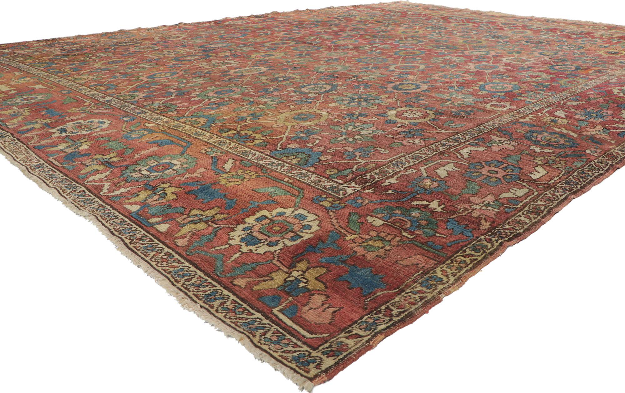 78290 Antique-Worn Persian Bakshaish Rug, 10'09 x 14'08.
Laid-back luxury meets nostalgic charm in this hand knotted wool antique-worn Persian Bakshaishh rug. The Herati design and rustic earthy hues woven into this piece work together resulting in