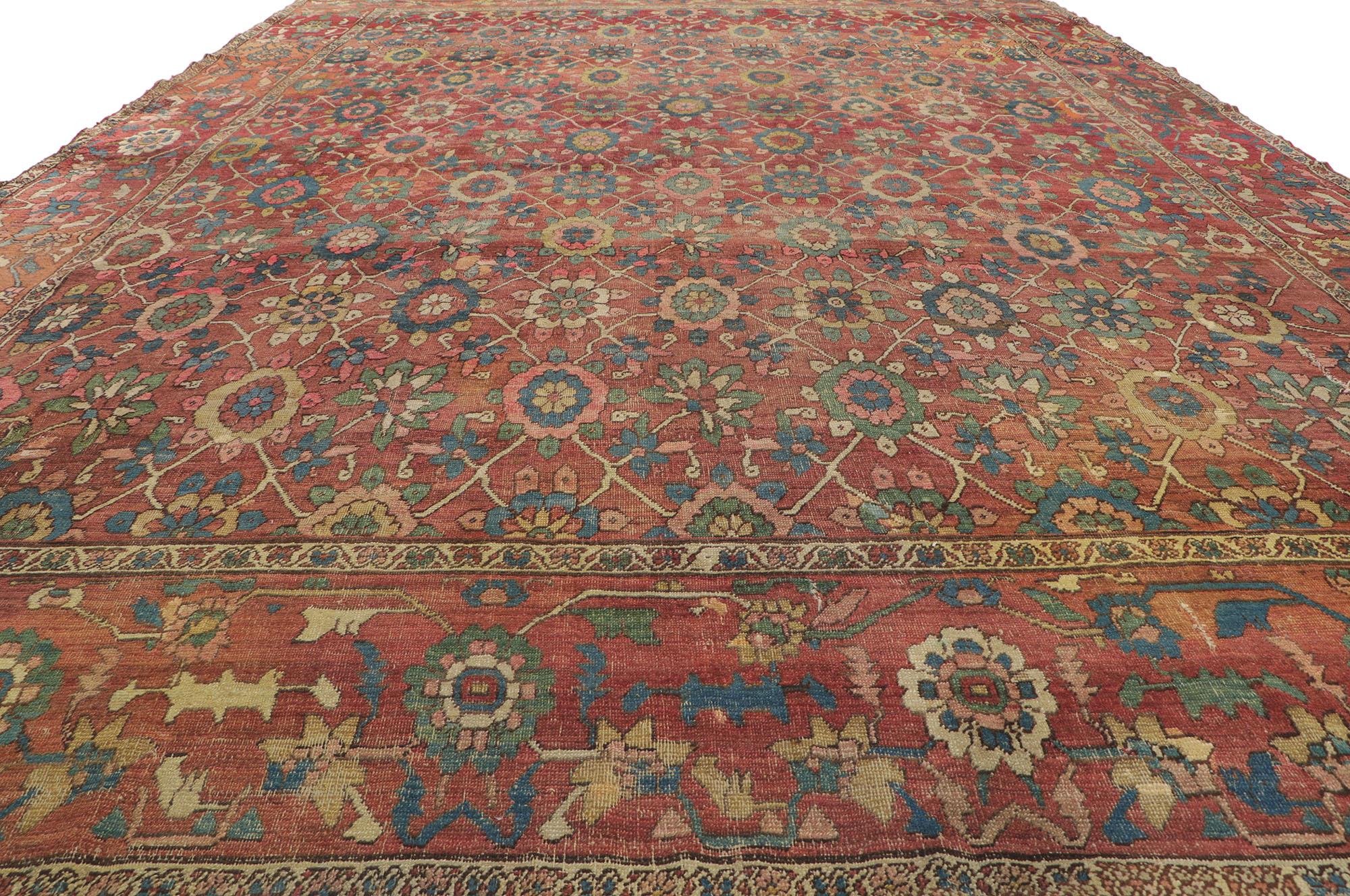 Antique-Worn Persian Bakshaish Rug, Laid-Back Luxury Meets Nostalgic Charm In Distressed Condition For Sale In Dallas, TX