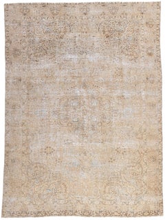 Antique-Worn Persian Tabriz Rug, Weathered Finesse Meets Laid-Back Luxury