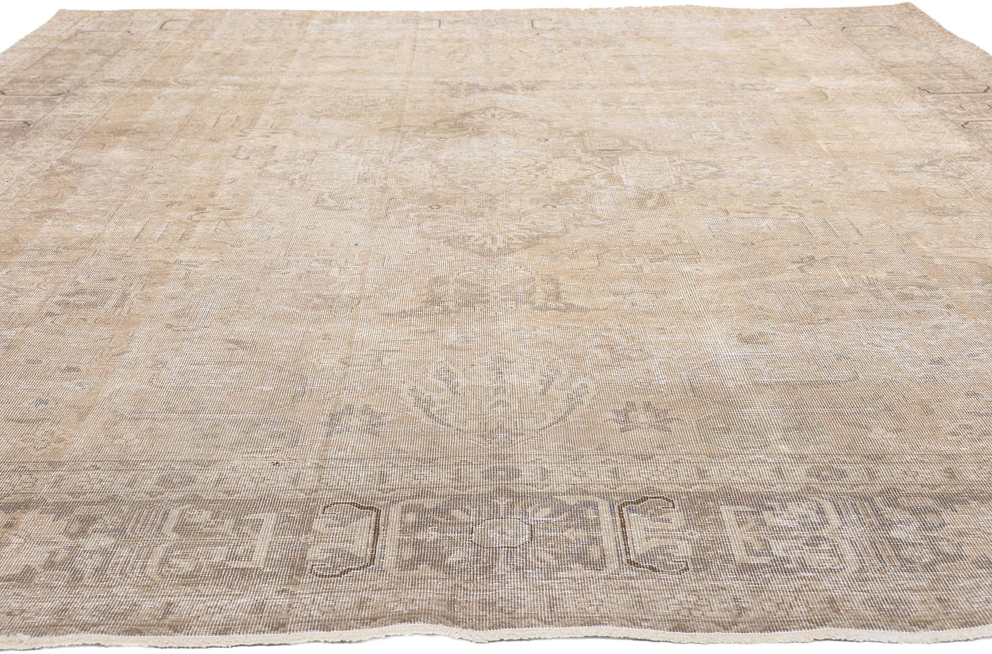 Tabriz Antique-Worn Persian Tabrz Rug, Weathered Finesse Meets Tonal Elegance For Sale