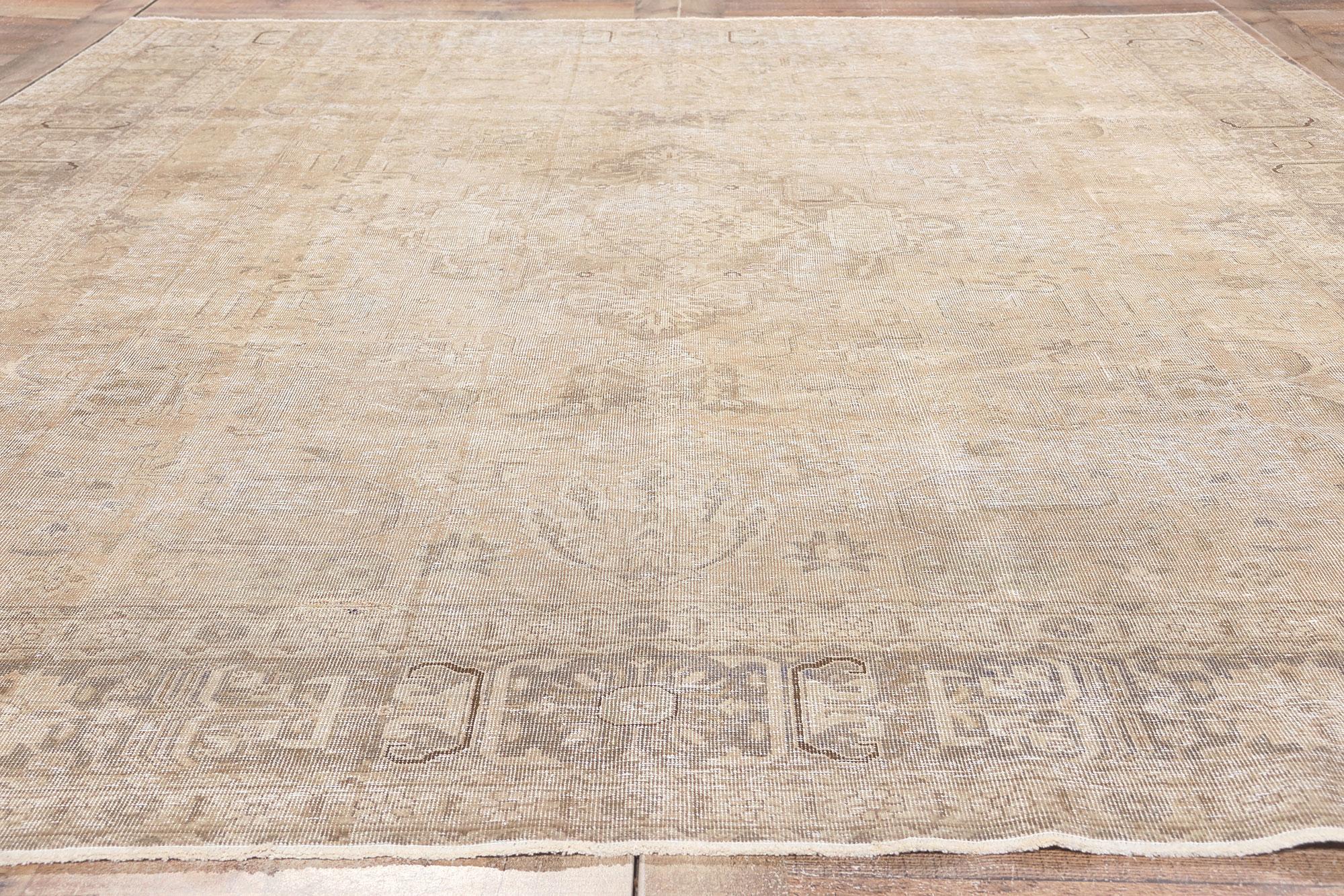 Antique-Worn Persian Tabrz Rug, Weathered Finesse Meets Tonal Elegance For Sale 1