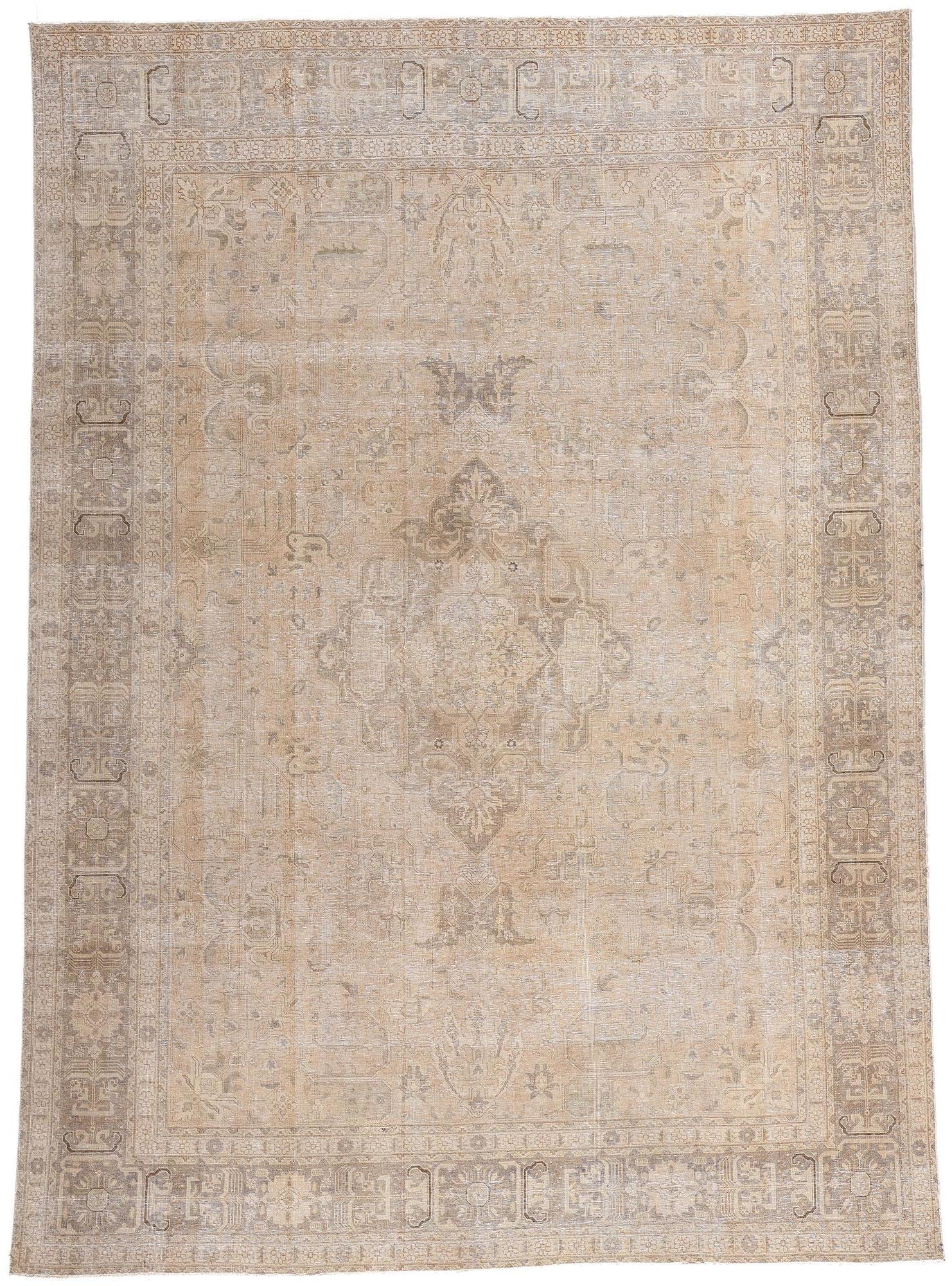 Antique-Worn Persian Tabrz Rug, Weathered Finesse Meets Tonal Elegance For Sale