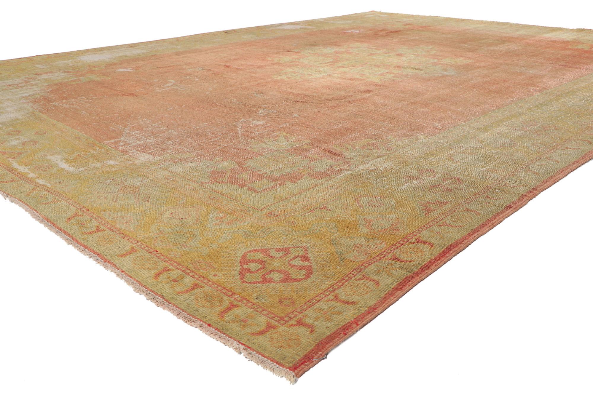 51238 Antique-Worn Turkish Oushak Rug, 09'07 X 13'00. 
Weathered finesse meets relaxed refinement in this hand knotted wool distressed antique Turkish Oushak rug. Let yourself be whisked away on an enchanting journey of sustainability, as you step