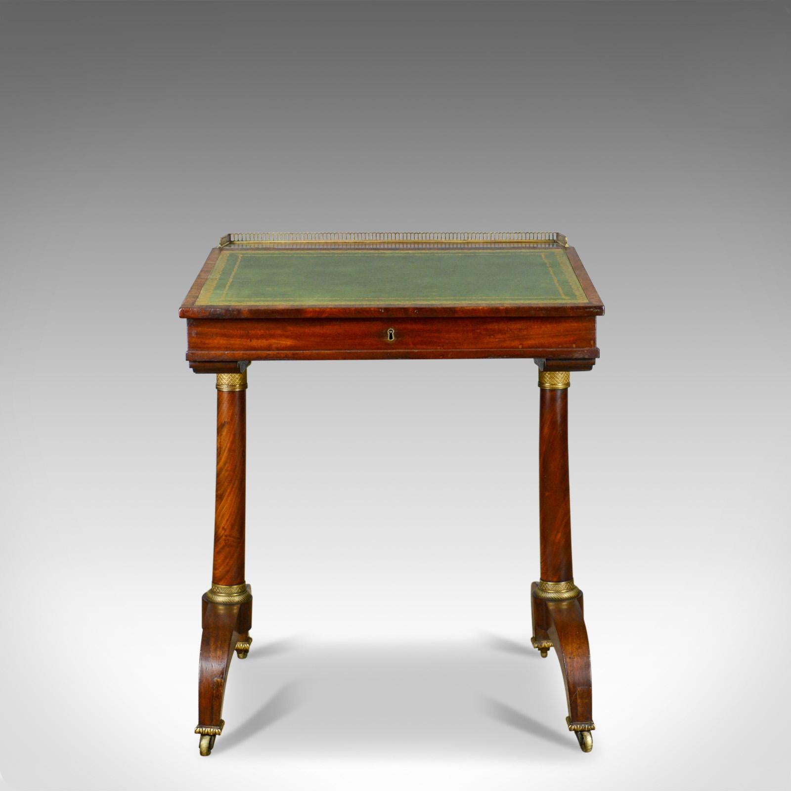 This is an antique writing table, an English, Regency, mahogany, open Davenport dating to the early 19th century, circa 1820.

Of quality craftsmanship in select mahogany
Good colour with a desirable aged patina
Grain interest throughout with a