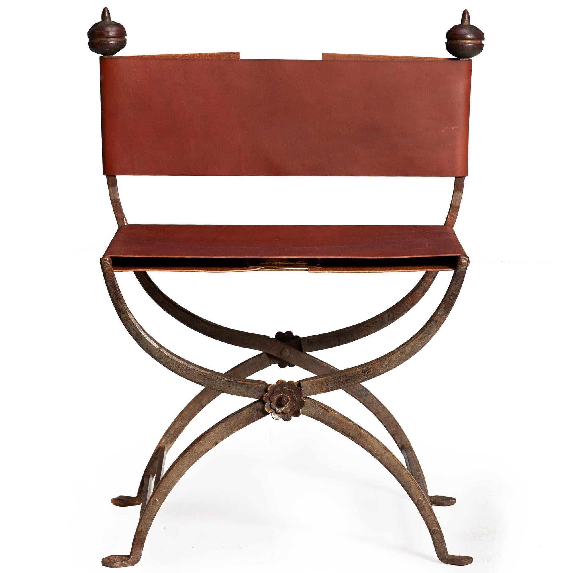 POLYCHROMED WROUGHT-IRON AND SADDLE-LEATHER SAVONAROLA CHAIR
With cerule form, probably early 20th century
Item # 311ESB30P
** Sold individually, but we may have up to 4 of these chairs available **

A very compelling form, this classical