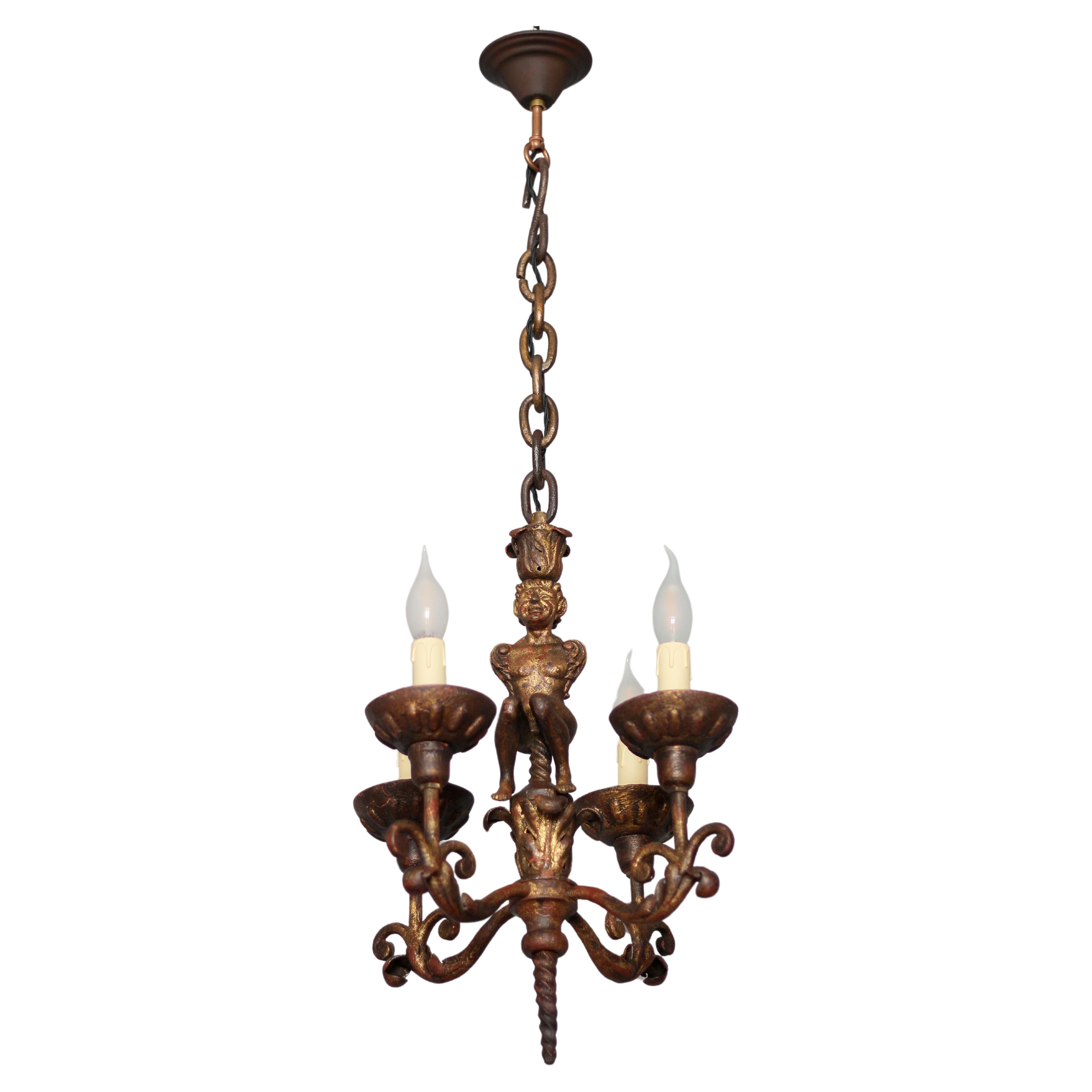 Antique Wrought Iron Baroque Style Four-Light Figural Chandelier, France For Sale