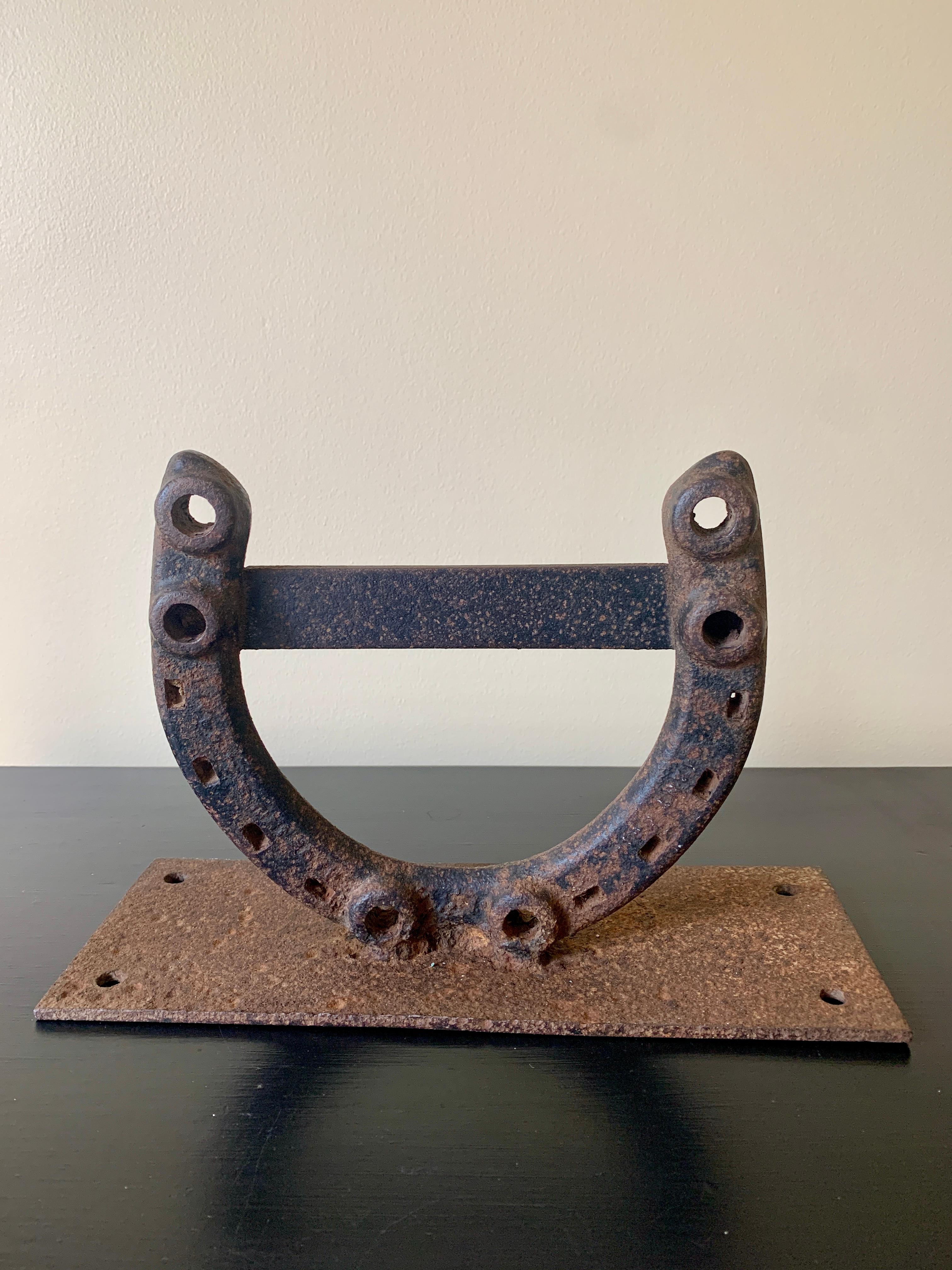A beautiful rustic, farmhouse equestrian antique cast iron horseshoe boot scrape perfect for your country house, ranch, or stables.

USA, Early 20th Century

Measuers: 12