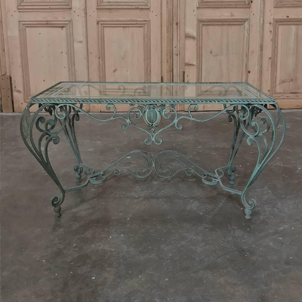 vintage wrought iron table with glass top