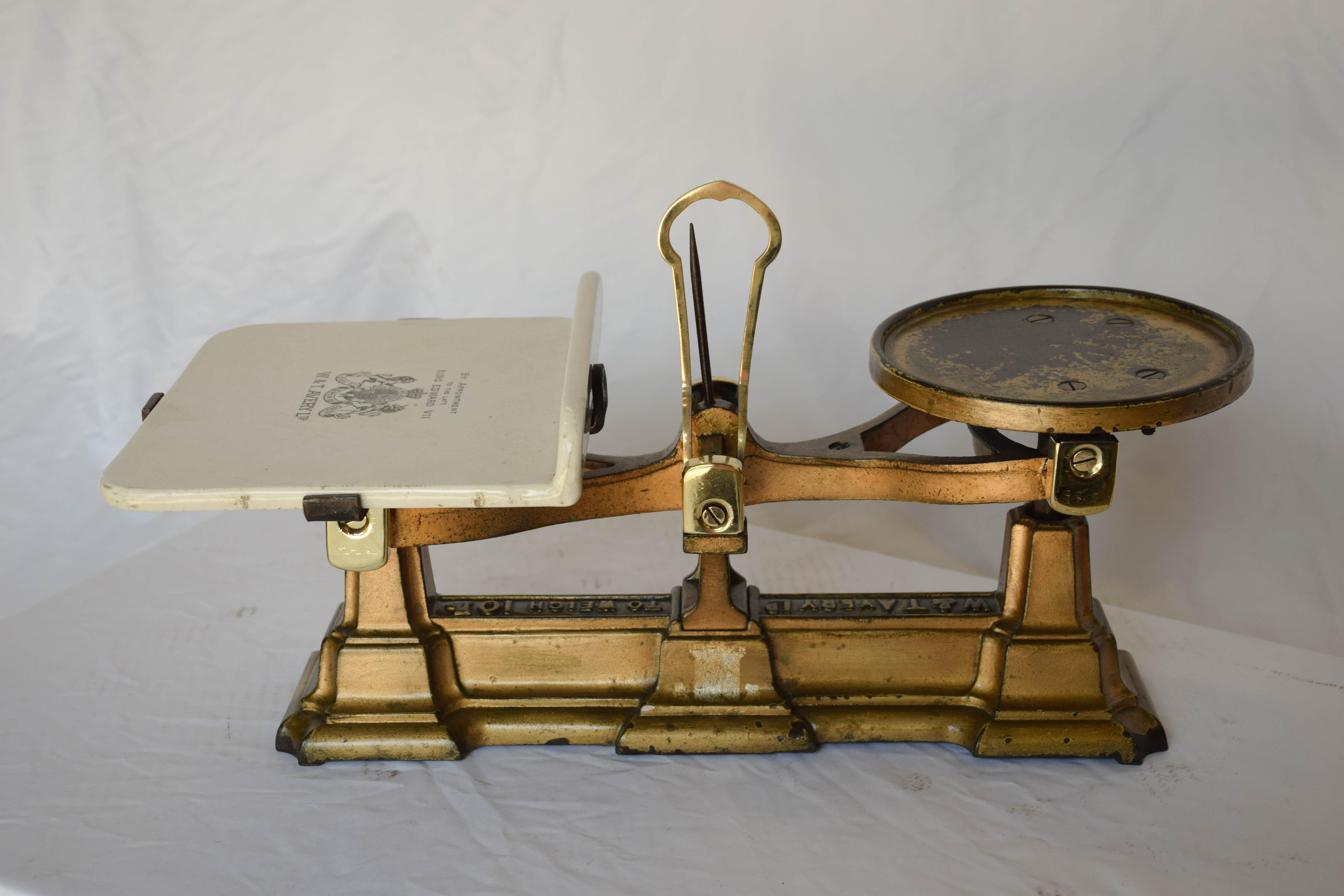Antique wrought iron weight balance scale by W and T Avery Ltd. Lovely black transfer on a porcelain china plate, by appointment by the late King Edward VII. This scale would look great in any kitchen decor.