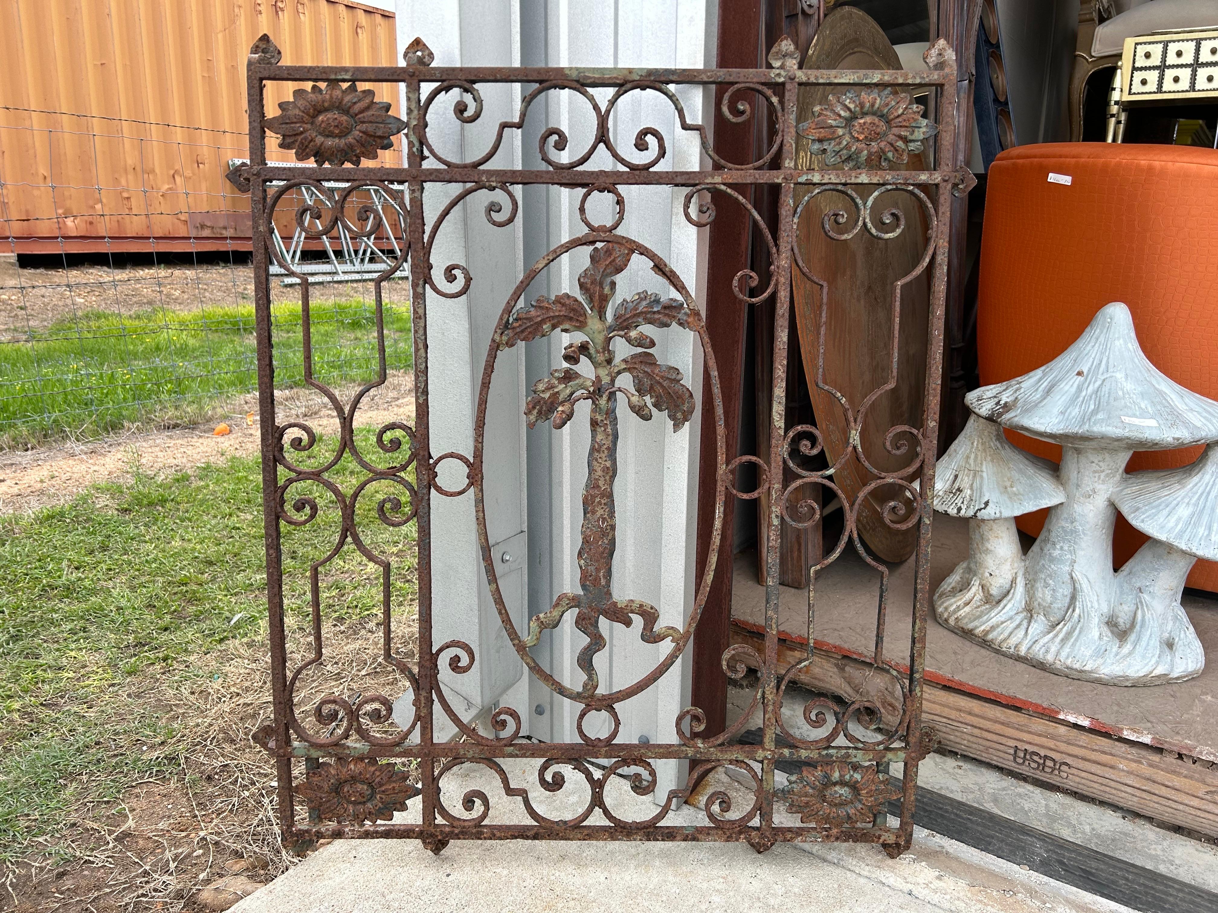 Antique Wrought Iron Window Grate.
Offered is a stunning antique wrought iron window grate with a well executed central oak tree with acorns and four corner medallions. This beautiful wrought iron window guard, window grill or architectural