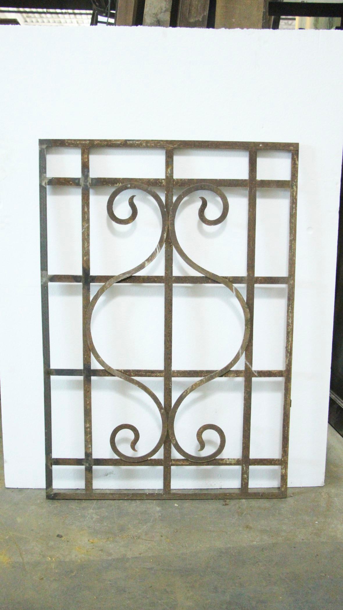 1920s antique wrought iron window guard or grill. Hand wrought and hand forged. This can be seen at our 400 Gilligan St location in Scranton, PA. Measures: 50.5 inches x 34.75 inches.