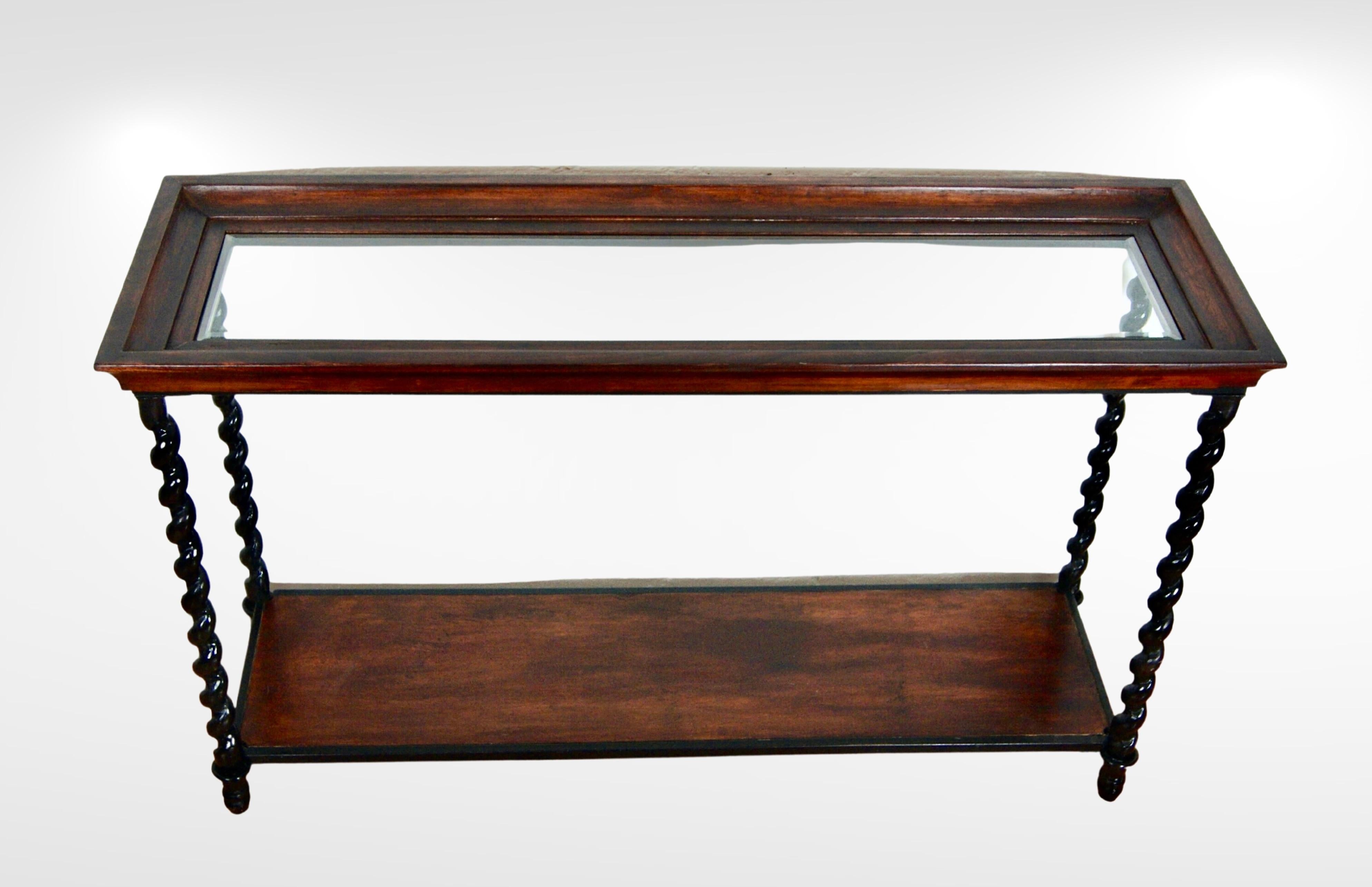 Unique antique Victorian old hall console table circa 1930s.
Large sized rectangular console desk.
Made of twisted wrought iron steel bar frame in colour glossy black, bolted unto solid mahogany wooden surround and mahogany base shelf.
The wooden