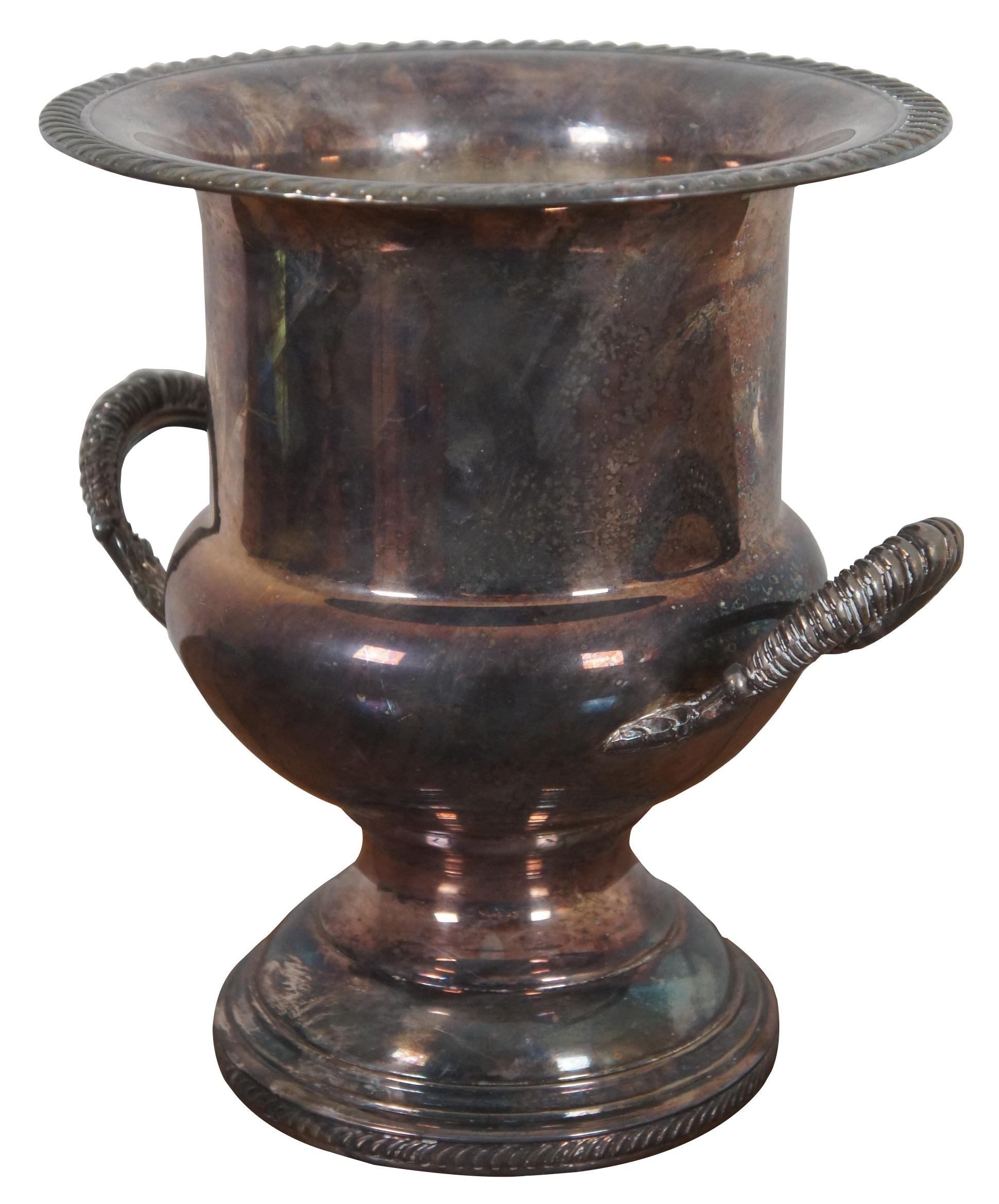 Antique W&S Blackinton number 917 fine silver plate trophy urn style ice bucket or champagne chiller with handles and footed base. “ Started by 2 brothers in 1865. W. S. Blackinton Co. was originally a manufacturer of gold jewelry in Meriden, CT.