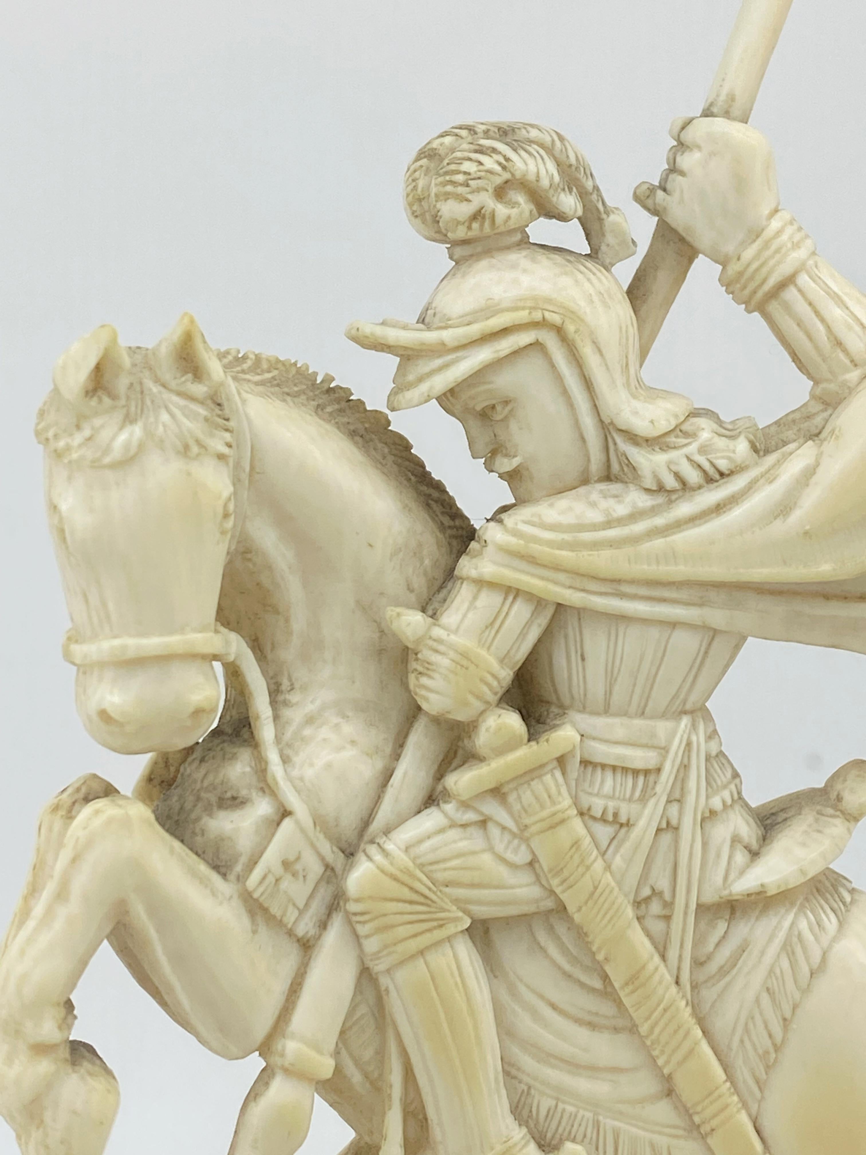 This Fine & Rare Early Natural Carving
of incredibly detailed figure of 
St George slaying a Dragon on a timber base
dates from XIXc,
yet is in beautiful original condition (no damage)

Of Dieppe style

Height: 16cm
Carving’s dimensions: 11cm x 8cm