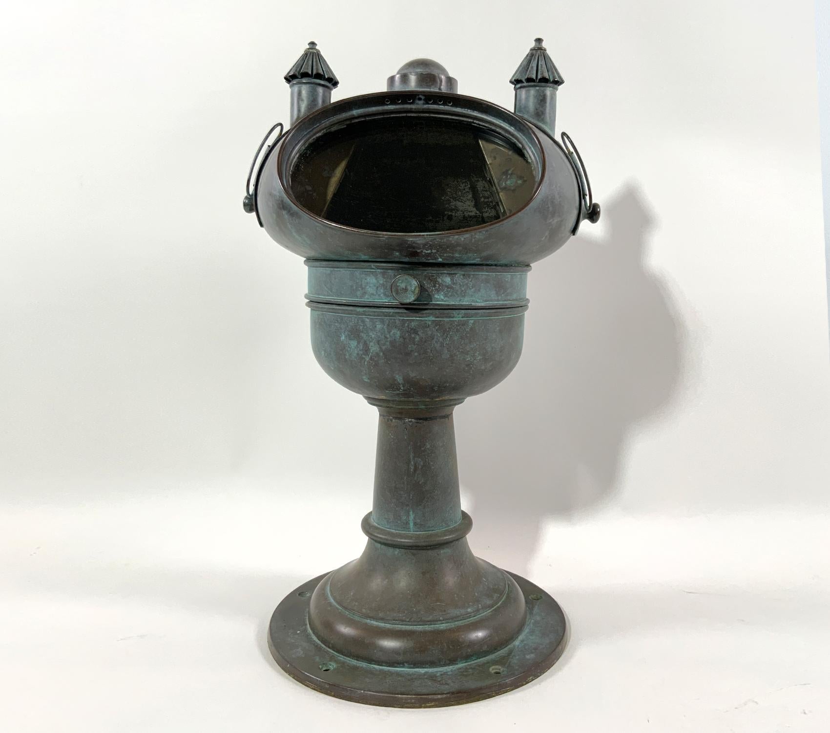 Nineteenth century yacht binnacle in original untouched condition. With mushroom top and matching burners. Oval viewing port exposes the gimbaled compass marked with makers name of a 